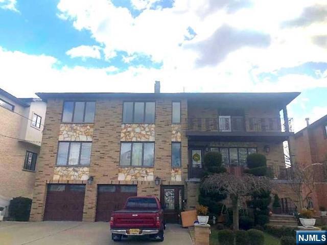 Freshly painted(2024) 1984 Built & Renovated(2024) Brick 2 family house 2nd floor unit on quiet street!Facing east/south/west all day bright!All tiled(except hardwood floors in brs)1,850sq.ft open & spacious layout w/front & back 2 terreaces!Huge living room & big dining room access to back terrace w/tree lined view!Modern eat in kitchen w/newer refrig(3yrs) & stainless hood(3yrs) and new sink & faucet & new dishwasher!Master bedroom w/walk in closet!Master bath w/new vanity sink & new toilet & new medicine cabinet and stall shower!Hallway full bath w/new white toilet & extra cabinet!2 extra bedrooms are good size w/ample closet space!Your own washer/dryer for convenience!All new blinds & new light fixtures & new screens & new closet door & new outlet cover!Close to schools & parks & shopping & transportation!Water & very left side 1 driveway parking space is included!