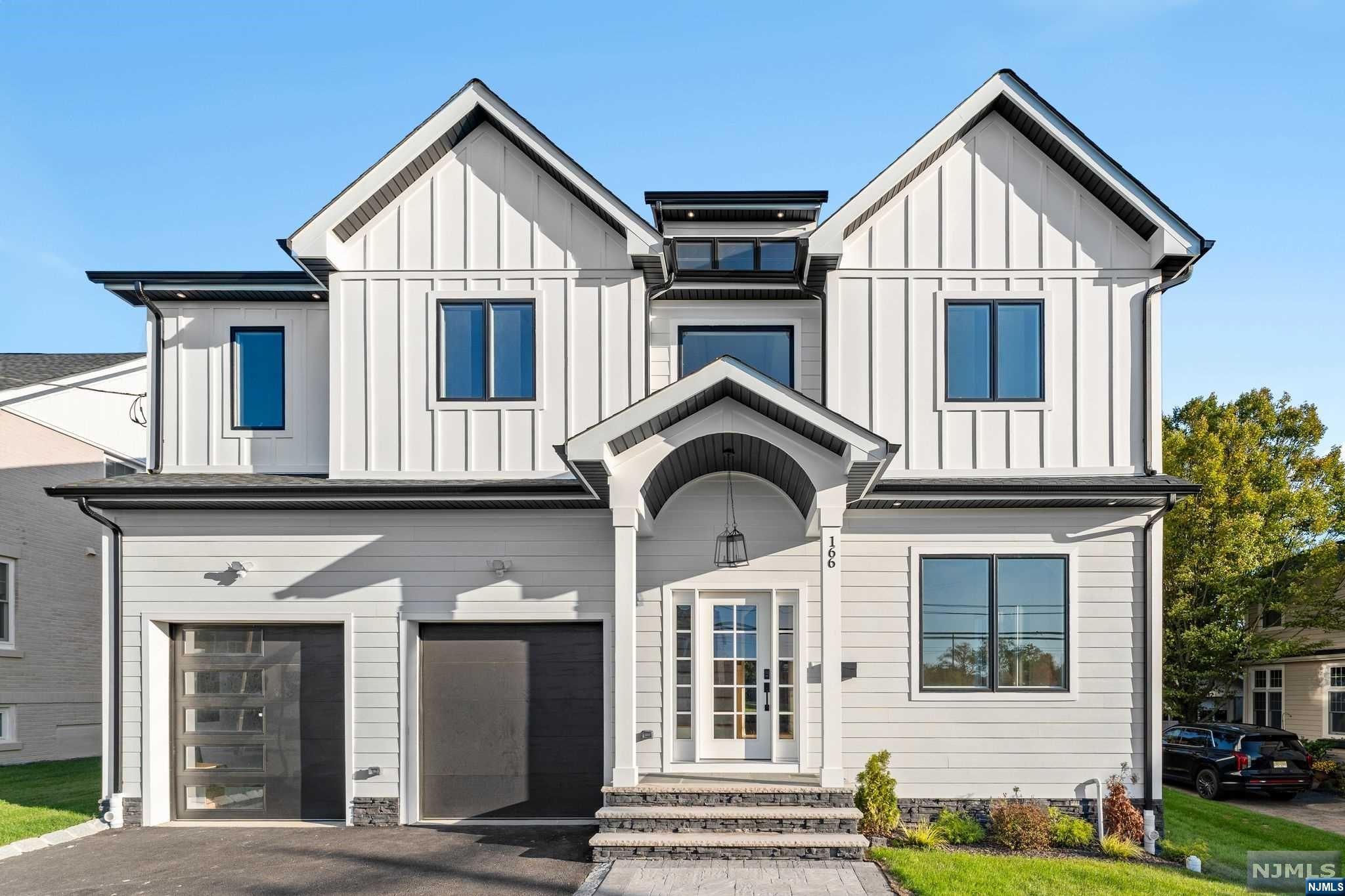 Brand new-custom home, surrounded by luxurious residences and situated on a sprawling 15,000 sq. ft. lot, endless possibilities to create your outdoor oasis. With a 10Year Warranty, this masterpiece spans approximately 5,000 sq. ft. across three meticulously designed level. Boasting 6 bedrs and 5.1 bath, the home greets you with a grand 2 story foyer & 10 ft ceilings throughout, leading to living/dining rms w/ intricate millwork & rich hardwd floors. Chef's kitchen, featuring high end appliances, large center island w/ quartz countertops, custom cabinetry, a wetbar, and a walk-in pantry. A gas fireplace while sliding doors open to a deck overlooking the oversized yard. The first flr offers an en suite bedroom. Upstairs, you'll find 4 additional bedrms, including the luxurious master suite, complete w/ a tray ceiling, an oversized walk in closet, and a spa inspired bath featuring a soaking tub, stall shower, and double vanity. Finished walkout basement with 9ft ceiling.