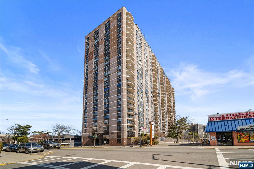 Welcome to the "pet-friendly" Greenhouse Condo in Northern Cliffside Park! This South-facing 2-bedroom, 2 updated bathrooms with a dining room, a den, and a balcony offers sweeping views of Manhattan, the Hudson River, and Western views of The Meadowlands from all the large updated windows. The monthly fee includes all utilities, high-speed 500 Mbps WiFi, Spectrum cable with HBO/Showtime, home phone, 2 covered non-tandem parking spaces (#281 & #282), bin storage (#68), and bicycle storage. No amenity fee for the large gym, studio gym, outdoor pool, and new pickleball/multi-use court. The NYC express bus is across the street. Many popular restaurants are a few blocks away, and there is convenient shopping nearby. Please note - The Greenhouse is a non-smoking building.