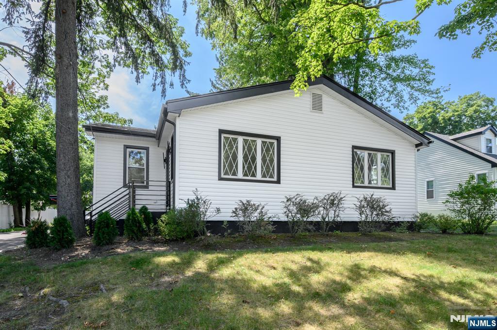 Welcome to this beautiful newly renovated 3 Bed, 2 Full & 2 Half Bath Ranch in the highly desirable town of Allendale. Thoughtfully redesigned w/modern finishes, hardwood floors, & recessed lighting all through + an open, inviting layout. Main level features a bright living room w/soaring vaulted ceiling, formal dining room, & a stunning eat-in kitchen showcasing quartz counters w/coordinating backsplash, a large center island w/seating, premium cabinetry w/under-cabinet lighting, & SS appliances. Sliding glass doors open to the deck, for seamless indoor-outdoor living & al fresco dining. A stylish powder room adds convenience for guests. Down the hall, 3 generous bedrooms, inc a spacious primary suite w/a private ensuite bath. Two additional bedrooms share a well-designed Jack-and-Jill bath. Finished basement expands the living space w/a large rec room, versatile bonus room ideal for a home office, gym, or playroom, a powder room, laundry area, utilities, & storage. Outside, enjoy a plush, backyard w/a deck for entertaining or relaxing. New 1 car garage & oversized driveway provide parking for you & guests. Other features include a New roof w/30 yr warranty, electric, plumbing, & HVAC system w/both units warrantied. This exceptional home offers modern style, functional living spaces, & an unbeatable Allendale location. Close to shopping, dining, parks, & schools + public transportation & major roads for easy commuting. Don't wait, this could be the one for you! Come & see!!