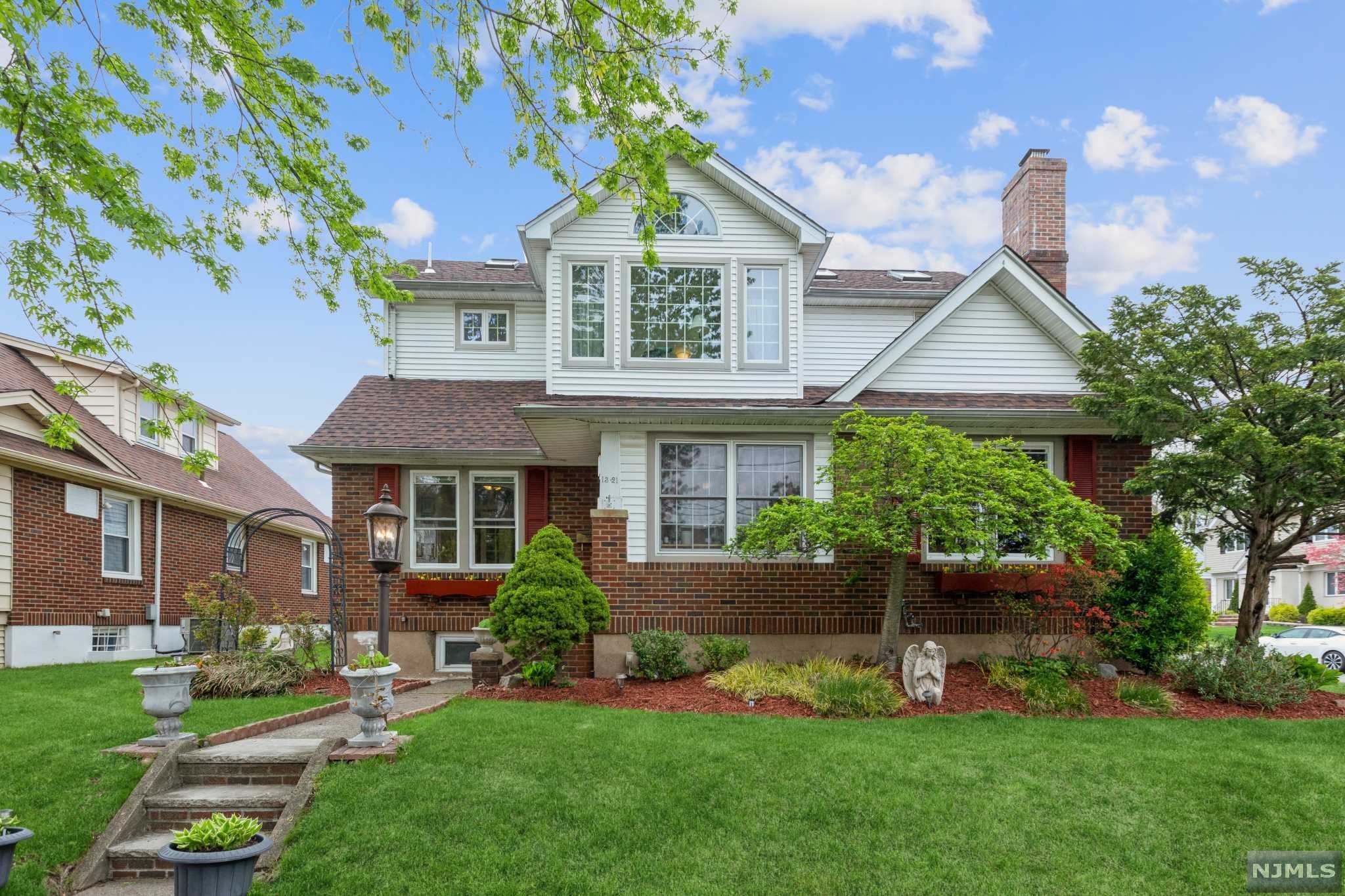 Spacious, expanded Colonial is situated on a manicured corner lot on a quiet street with a bus stop right on the corner, just half a mile to the train station, close to schools, shopping, and many parks. Offering five bedrooms, four full bathrooms, a screened-in porch, and a detached one-car garage, this home offers ample living space & charm. The welcoming front entry opens to a spacious living room with a wood-burning fireplace, a formal dining area that flows into the kitchen updated with granite counters, stainless steel appliances, and a breakfast bar, and breakfast area, a large sunny family room with double sliding doors to an enclosed porch & two main-level bedrooms separated by double doors, and a full bathroom. The second floor encompasses a lavish primary bedroom w/ WIC and full suite like bthrm& sitting rm, plus two more bedrooms and a full hallway bathroom! The finished basement offers even more living space with a recreation room, a bonus room, full bath & much more!