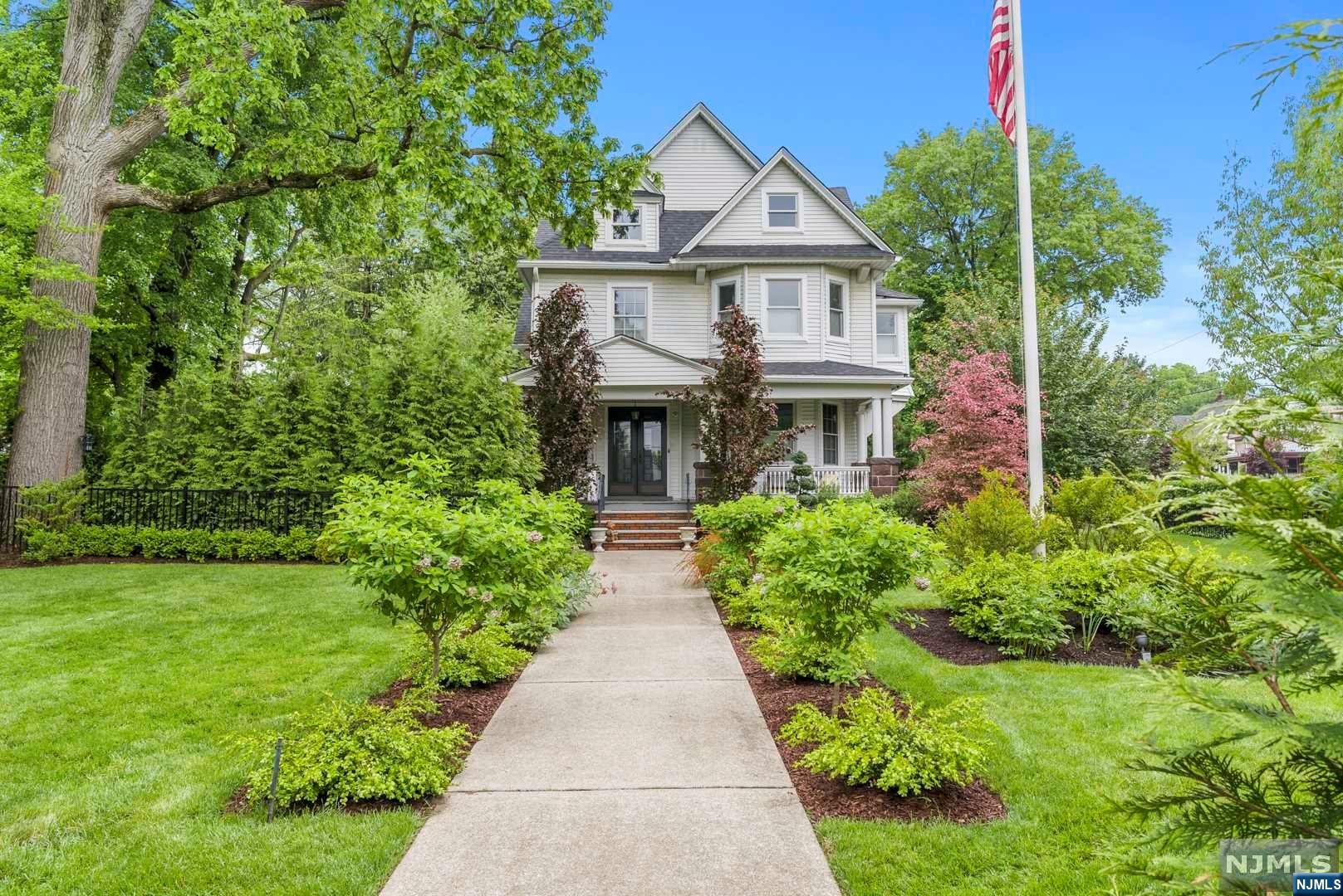 Location location location! Blocks away from the GWB; in the desirable town of Leonia. This tastefully remodeled Victorian features 6 bedrooms, 3 full and 2 half baths with four floors finished to perfection! Additional features include; high volume ceilings, open floor plans and transitional accents throughout with no details spared. Completely renovated with significant home system and build upgrades. The gourmet kitchen comes with top of the line appliances. Contemporary living featuring, on-trend decor, architectural details, fine finishes and beautiful hardwood floors. Impressive and expansive side property with an oversized 2 car garage and 6 car paved driveway. Beautifully landscaped & paved patio with park-like sized yard offers a private oasis. **This house is uniquely zoned both residential and professional!** Steps away from NYC transportation and top rated school system! A home you'll never want to leave! A true must see!