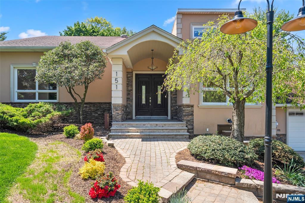 Tucked away in a peaceful, private setting on a long, quiet driveway, this property offers tranquility, privacy, and ownerâ€™s pride throughout. This 4 bed, 4 Full bath home is perfect for families, with one of the upstairs bedrooms spacious enough to comfortably accommodate two children with two bedsâ€”providing flexibility and room to grow. The modern kitchen, renovated approximately 5 years ago, blends style and functionality, while the basement features a full in-law suite complete with a kitchen area (ready for a stove and refrigerator), laundry hookups, a full bath, and an officeâ€”an ideal setup for multi-generational living. Meticulously maintained inside and out, the home showcases thoughtful care at every turn. The roof is less than 10 years old, and comfort is ensured year-round with individually controlled electric baseboard heating in every room, along with a heat pump and central AC, all under 5 years old. Outdoors, the property offers a park-like setting with mature trees and beautifully landscaped front and back yards, enhanced by a sprinkler system that keeps the grounds lush and vibrant throughout the seasons. And with a 5-minute walk to the bus stop and a 40-minute commute to Manhattan, youâ€™ll enjoy the perfect balance of serene suburban living and convenient city accessâ€”a truly wonderful place to raise your family. SHOWINGS START 4/3, SUN. 1â€“4 PM OPEN HOUSE. For a private tour, call or text Sunny Hwang with RE/MAX Now.