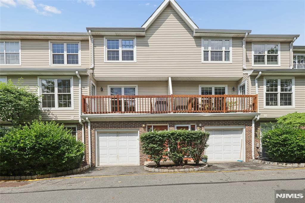 Renovated 2BR/2.5BA Townhome in Gated Westgate Community This beautifully renovated 2-bedroom, 2½-bathroom home offers 1,364 sq. ft. of stylish, move-in-ready living. Enjoy hardwood floors throughout, a modern kitchen with granite countertops and quality cabinetry, east-facing tree views, an attached garage, and in-unit washer/dryer. Resort-style amenities include an indoor pool, gym, and 24-hour security. HOA covers internet, cable, and water. Located near the community's back entrance for easy Route 46 bypass â€” perfect for NYC commuters. Ample visitor parking steps away.