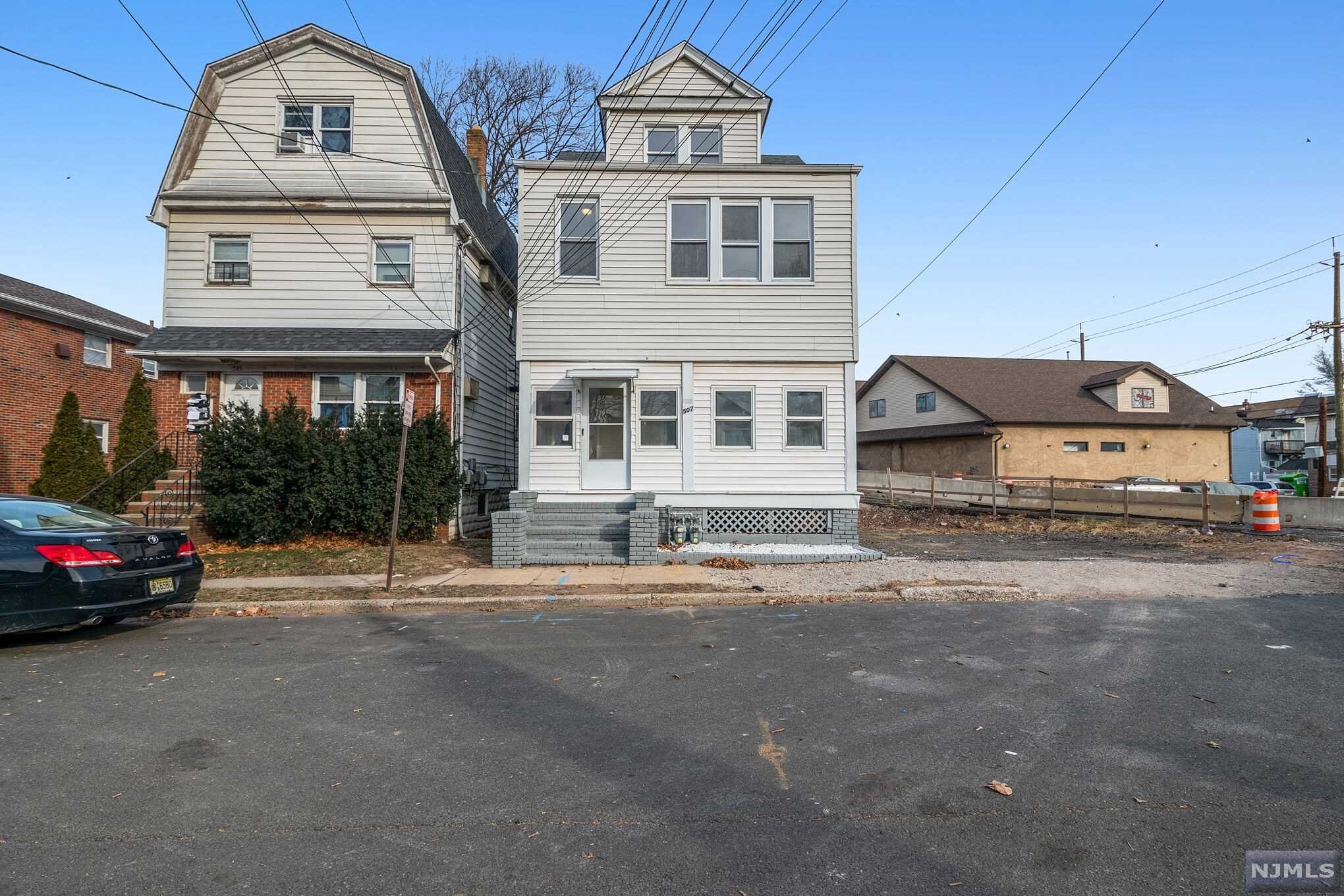 2 units! Move in ready! 2nd Unit - 3 Bedrooms 1 and a half bathrooms, Kitchen, Living room. 1st Unit - 1 Bedroom 1 and a half bathrooms, Kitchen, Living room, Plus finished basement! Large Parking Area! A must see!