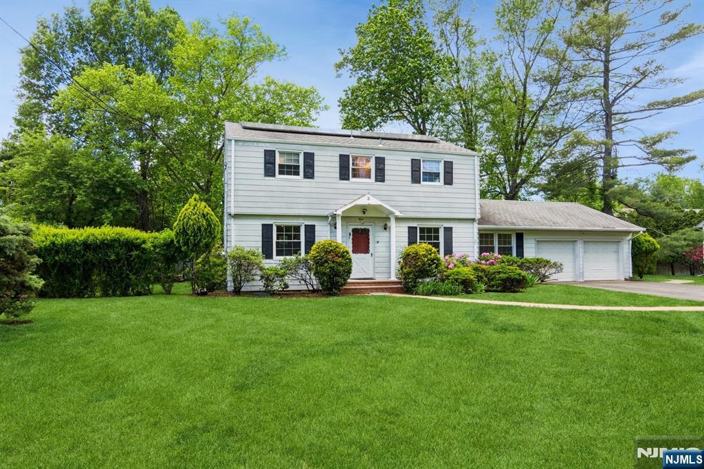 Popular Center Hall COLONIAL in DESIRABLE Cherry Hill section of Livingston on .34 Acres of LEVEL Property. Welcoming Foyer flanked by Freshly Painted Formal Living & Dining Rooms. Eat-In Kitchen w/SLIDER out to Deck and PLAYABLE backyard. Convenient Family Room/Home Office, Powder room, Laundry room and 2 Car-Garage located right off Kitchen. Upstairs MASTER EN-SUITE with FULL BATH + 3 Additional Bedrooms and Hall Bath.850+ sq ft Basement ready to be finished. Most convenient location: Around the corner from Mt Pleasant Elementary/Middle school, playground, NYC bus stop & Town Center. Top Rated School district. Enjoy Life in Livingston!