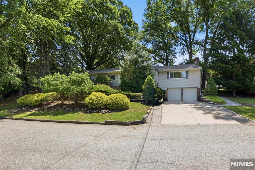 Handyman Special with Incredible Potential in the Heart of Norwood! Welcome to 165 Glenn Avenue, a fantastic opportunity to build instant equity in one of Bergen County's most desirable locations. This spacious home offers endless possibilities for investors, contractors, or buyers looking to customize a home to their own taste. The main level features a welcoming living room, formal dining room, generously sized kitchen, impressive family room with vaulted ceilings, three bedrooms, and two full bathrooms. The massive unfinished basement provides tremendous value-add potential with plenty of room for additional living space, a home office, gym, recreation area, or storage. The property also features a large two-car garage with interior access, ample driveway parking, a nicely sized backyard, spacious deck, custom paver patio, and built-in barbecue perfect for entertaining. Located in the highly sought-after Northern Valley Regional School District and just minutes from top-rated schools, parks, shopping, dining, transportation, and major roadways, this home offers the perfect combination of location, space, and opportunity. Being sold strictly as-is. A rare chance to create something special in a premier neighborhoodâ€”schedule your private showing today before it's gone!