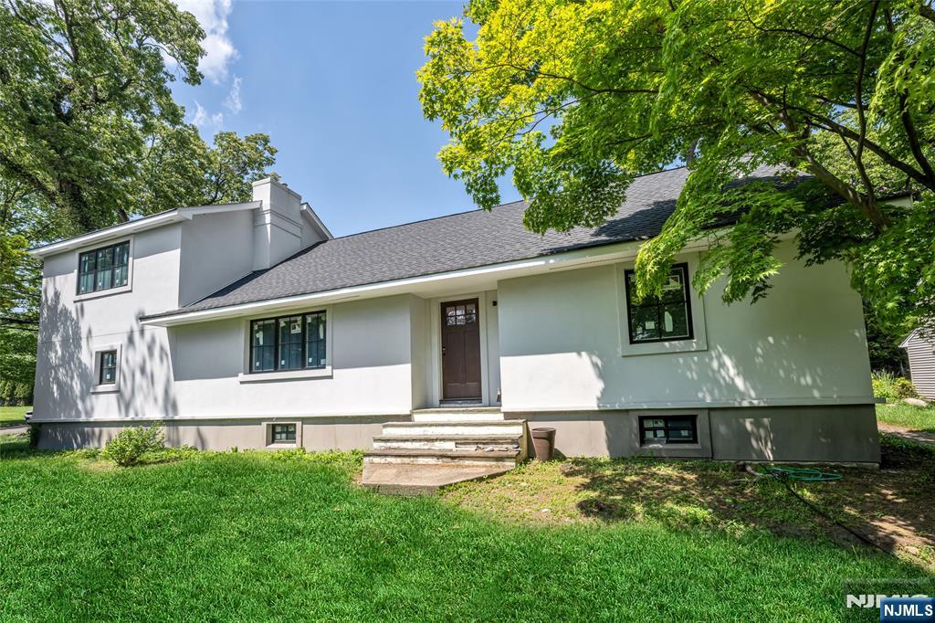 Exceptional opportunity for investors, builders, contractors, or buyers looking to make a home their own in Ridgewood's sought-after Willard District! This 5-bedroom, 3-bath home offers tremendous potential, with two bathrooms already gutted to the studs, new Anderson windows in place in certain rooms, and some recent work completed on the second level. The first level provides a spacious canvas for your imagination, while the unfinished basement offers additional possibilities for future finishing/living space or storage. Conveniently located blocks from Willard Elementary School and George Washington Middle School, as well as parks, tennis courts, downtown Ridgewood, and NYC transportation, this is a rare opportunity to renovate, expand, or reimagine a property in one of Bergen County's most desirable towns.