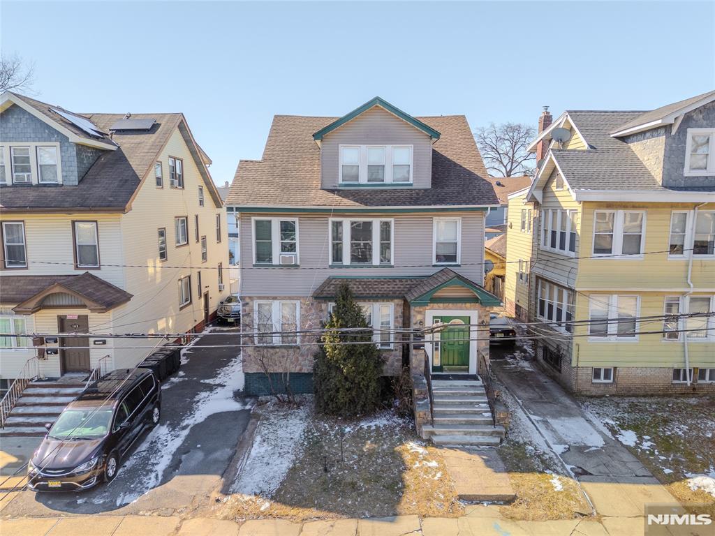 Spacious 3-Family Home in the Heart of Weequahic, Newark Discover this oversized 3-family home as per state documents 3,214 sq. ft. of living in the sought-after Weequahic section of Newark. Featuring large rooms, high ceilings, and endless potential, this property is perfect as a multi-generational family home or a valuable addition to your investment portfolio. Offered As-Is, this home presents a rare opportunityâ€”on the market for the first time in 45 years! With a few updates, you can unlock its full potential. Donâ€™t miss this chance to own a piece of Weequahic history. Please note this home has 2 oil tanks in front yard, it will be the buyer's responsibility to fill or remove.