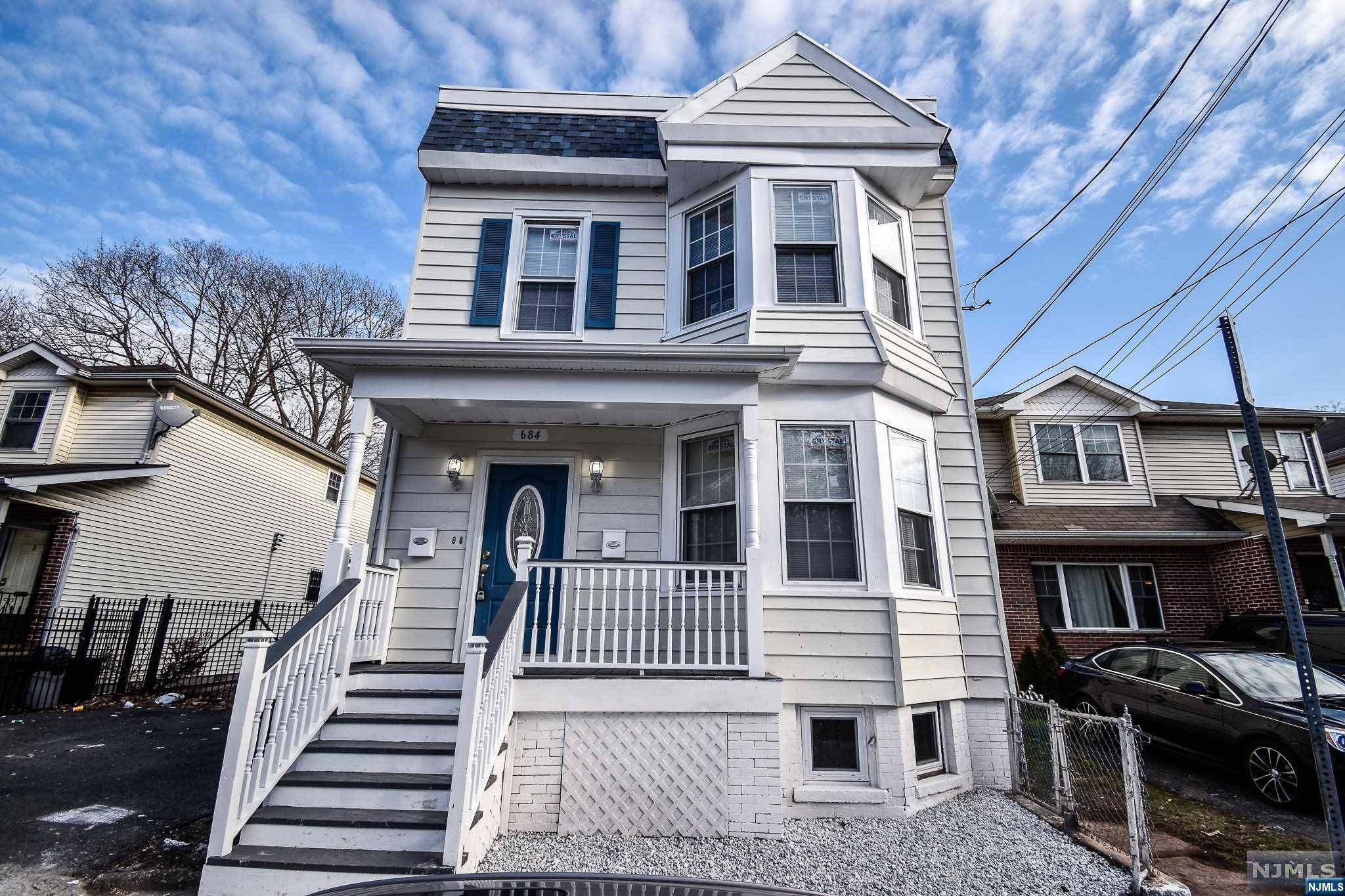 This meticulously maintained 2-family residence, renovated in 2020, is an ideal investment opportunity or a perfect choice to live. Boasting a total of 6 bedrooms and 2 baths, this property is a true gem. Each identical unit consists of 3 bedrooms and 1 bath. The eat in kitchen is huge and equipped with stainless steel appliances. The original hardwood floors are in immaculate condition. Great sized backyard and extra storage in the back. Minutes from major highways and easy access to NYC transportation.