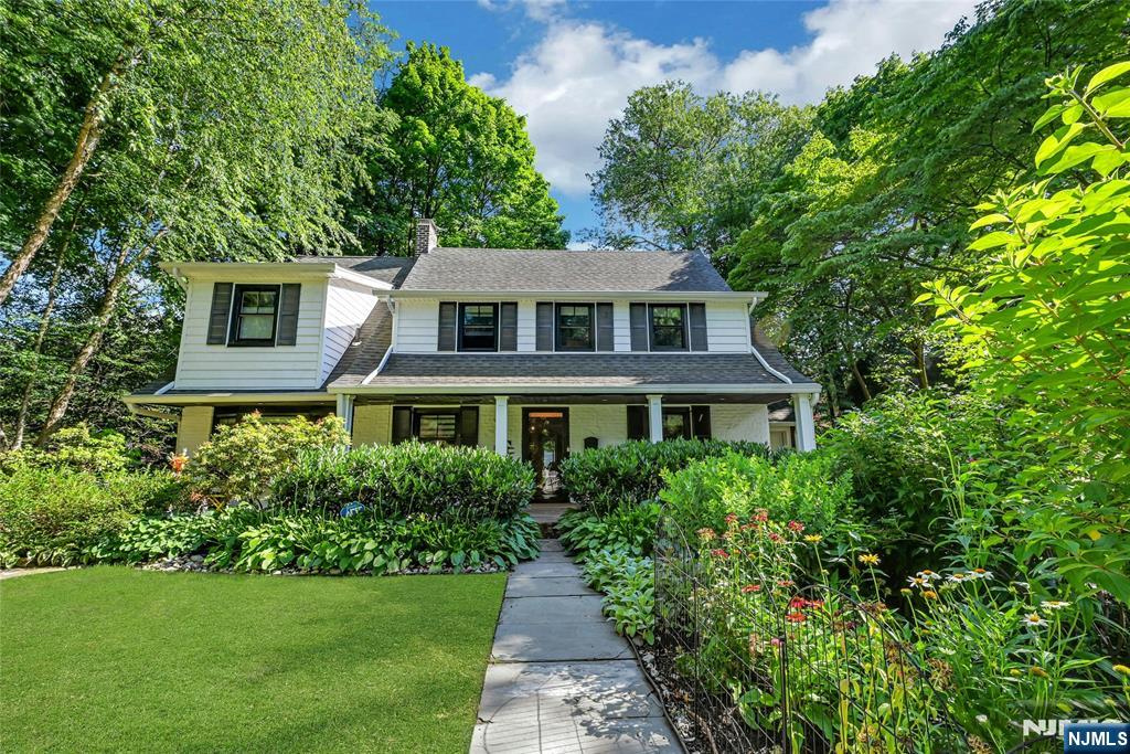 Nestled in a picturesque private cul-de-sac, this updated 3 bed home is a perfect blend of comfort and modern elegance. The experience begins when you step onto an inviting tiled front porch, complete with a swing where you can relax and enjoy the summer breeze! Inside, natural light fills the FLR, anchored by a gas fpl creating a warm and welcoming atmosphere. A large family rm provides space for everyday living and entertaining. A nice feature is the glass-enclosed 4-season sunroom, surrounded by mature hedges, which provides privacy and creates a peaceful retreat year-round. The FDR offers a modern touch for formal and relaxed dining and flows seamlessly into the updated kitchen, featuring KraftMaid cabinetry, black stainless-steel appliances, and abundant storage and workspace for the home chef. The 2nd level offers 3 spacious bedrms, including a primary ensuite with a separate private sitting area ideal for a home office, reading nook, exercise space, or quiet retreat. This level also offers an updated full main bathroom. The finished 3rd level offers a flexible bonus space with additional storage. Enjoy the peace and privacy of cul-de-sac living, with neighbors who share a sense of community. This home is not just a place to live; itâ€™s a sanctuary where comfort meets style in a charming setting. Close to transportation, shops, dining, parks, and houses of worship. Come see this hidden gem for yourself! Being sold â€œAs ISâ€.