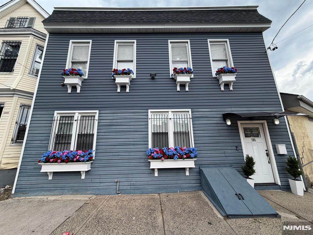 Welcome to 705 S. 15th St, a beautifully renovated single-family home updated in 2025. This move-in ready home offers modern finishes, high ceilings, hardwood floors throughout, and charming decorative flower boxes that enhance the home's curb appeal. The main level features a bright and open layout with a spacious living area and an updated kitchen with granite countertops, white cabinetry, stainless steel appliances, and a stylish tile backsplash. A versatile first-floor bedroom or home office provides flexibility for guests or remote work. Upstairs, you'll find three spacious bedrooms, including a large primary bedroom with a walk-in closet. The home features three full bathrooms with modern tile finishes. The fully finished basement provides additional living space with a large recreation area, a full bathroom, and a dedicated laundry area. Recent updates include new siding, a new roof, forced hot air heating, and a Ring video doorbell for added convenience and security. Conveniently located near major highways, shopping, restaurants, and public transportation. Schedule your showing today and experience everything this beautifully updated home has to offer.