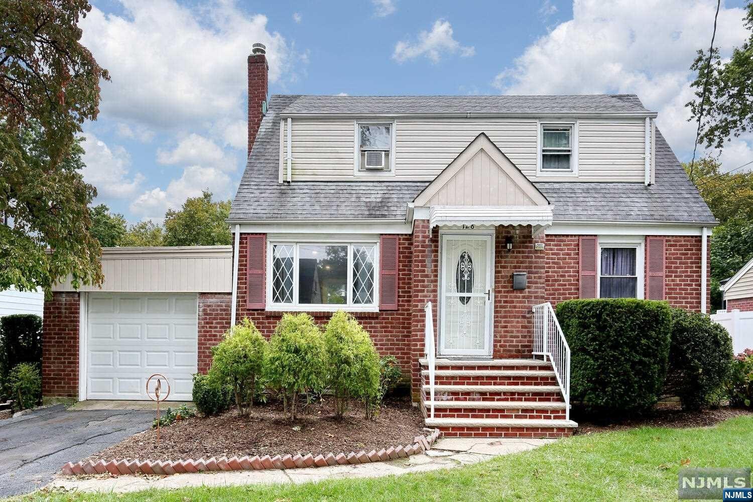 Beautifully updated four bedroom, two and a half bath Cape. The living space provides an open floor plan with hardwood floors throughout. Granite and stainless steel kitchen and modern bathrooms. Finished basement with a full bath, laundry and plenty of recreation space. Newer heating system, central air, LED lighting, updated electrical service. Attached garage, large private backyard for entertaining and only steps to schools, parks and NYC transportation. This home has what you're looking for. Come take a look, you'll be glad you did.