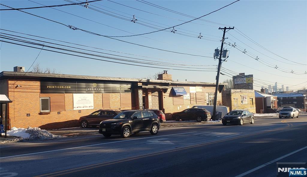 Good for the 1031 exchange property ( OPPORTUNITY ZONE applied). Rare to find the steady investment property in Bergen County. All occupied with lease expiry for more three years .( the shortest one will expire on Jan 31 2028 ) . Net Operating income : about $ 276,344( Cap rate : about 7.1% ). Great location on Bergen Blvd in Fairview bordering Hudson County. Totally renovated inside some years ago (New gas heating system , new plumbing, Sprinkler system, new LED lighting, fresh painting on wall, ceiling, newly polished hardwood floor, new toilets in all bathrooms). 1 loading dock( 1st fl) + 3 O/H door( ground fl). ceiling height : 16 ft ( ground Fl ), 12 ft ( 1st Fl)