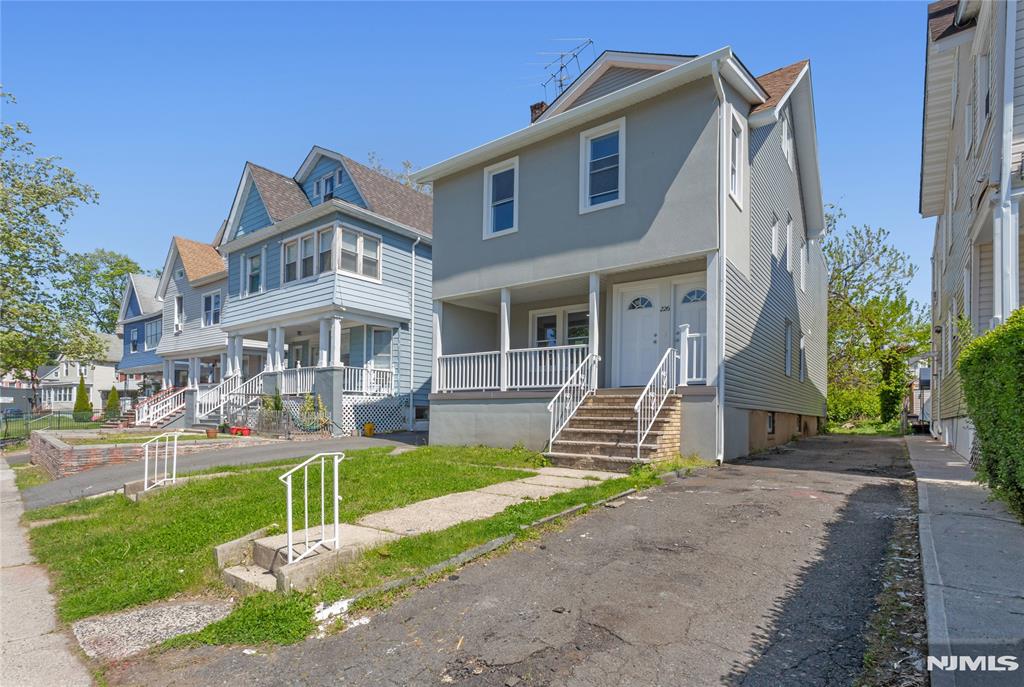 Beautifull, fully renovated 2 family home in great location, close to shopping, NYC transp, schools, featuring 2 large apartments consiting of 3/4 spacious bedrooms, modern tiled baths, eat-in kitchens, spacious living room, and dining rooms with fireplace, 2nd floor boasts a finished attic for add'l living space/office/guest room, convenient side stairs to outside/basement and fenced-in yard with newer driveway. All separate utilities. A MUST SEE HOME!