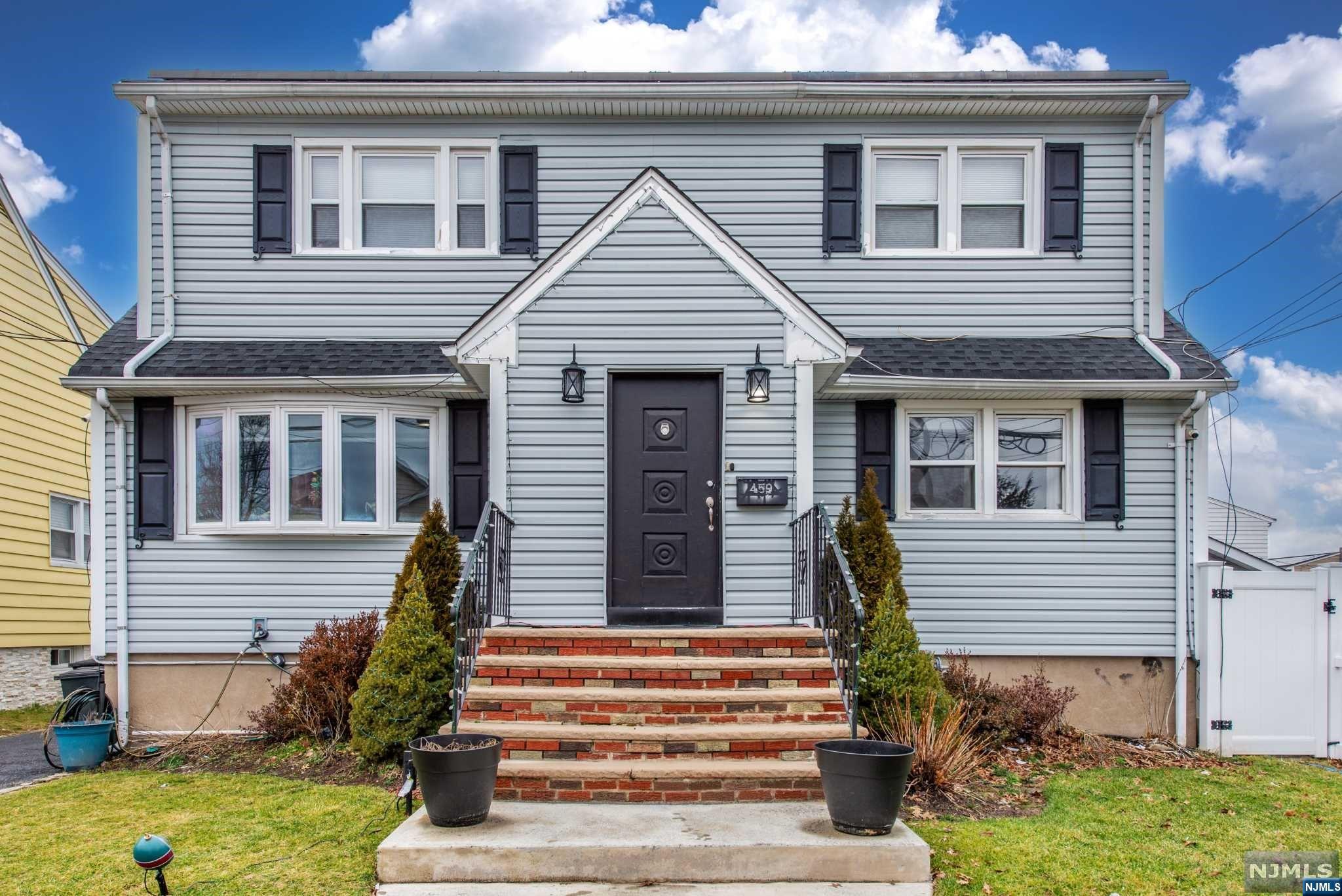 Welcome to this energy efficient 2-family home. First Floor boasts a spacious Living Room, Formal Dining Room with kitchen that provide direct access to the deck and backyard with above ground pool. Also full bathroom, and 3 large bedrooms. The first floor has direct access to finished basement with full bath, perfect for entertainment. There is a Laundry area in the basement and a separate area for an office or multipurpose room. There are 2 sump pumps in the basement, it has never flooded. Also Basement has a separate entrance to the backyard. Second Floor Unit provides a comfortable Living Room area, Eat-in Kitchen with all the appliance needed, 2 very generous bedrooms and full bathroom. Driveway can accommodate multiple cars. Close to highways, shopping malls and more!