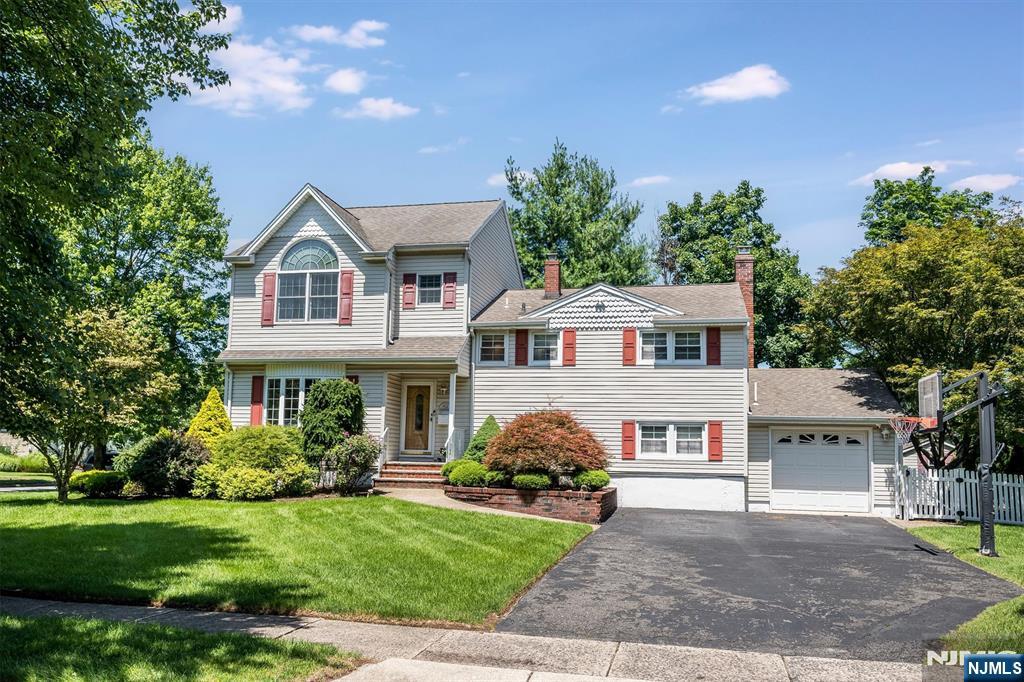 Welcome to this spacious,expanded home,ideally situated on a quiet street in the desirable town of Glen Rock.Offering 4 BRs & 3.5 bths,it features generous living spaces. A welcoming EF leads to a large LR w/beautiful bay window & an open flow into the semi-formal DR.The custom kitchen offers counter seating & overlooks the dining area,where SGDs open to the private deck & patio beyond,perfect for entertaining or simply enjoying the backyard.Just a few steps from the kitchen is a comfortable FR centered around a gas fpl framed by built-in cabinetry,along w/a convenient laundry, powder rm,& direct access to the attached garage.Upstairs,youâ€™ll find 4 generously sized BRs,including 2 w/ensuite bths.The spacious primary suite features vaulted ceilings,a large bth w/soaring ceilings,jetted tub & separate shower,& an incredible dressing room.An adjoining room provides the perfect space for a home office,nursery,exercise rm,or sitting area.Finished lower level expands the living space even further with a fabulous rec rm & 2nd finished space,offering endless possibilities for a media rm,playrm,game rm, home gym,or hobby space.Cedar closets provide abundant storage.Located in one of Bergen Countyâ€™s most sought-after communities,this home is just minutes from Glen Rockâ€™s top-rated schools,outstanding NYC trans,beautiful parks,& charming downtown filled w/local shops and restaurants.