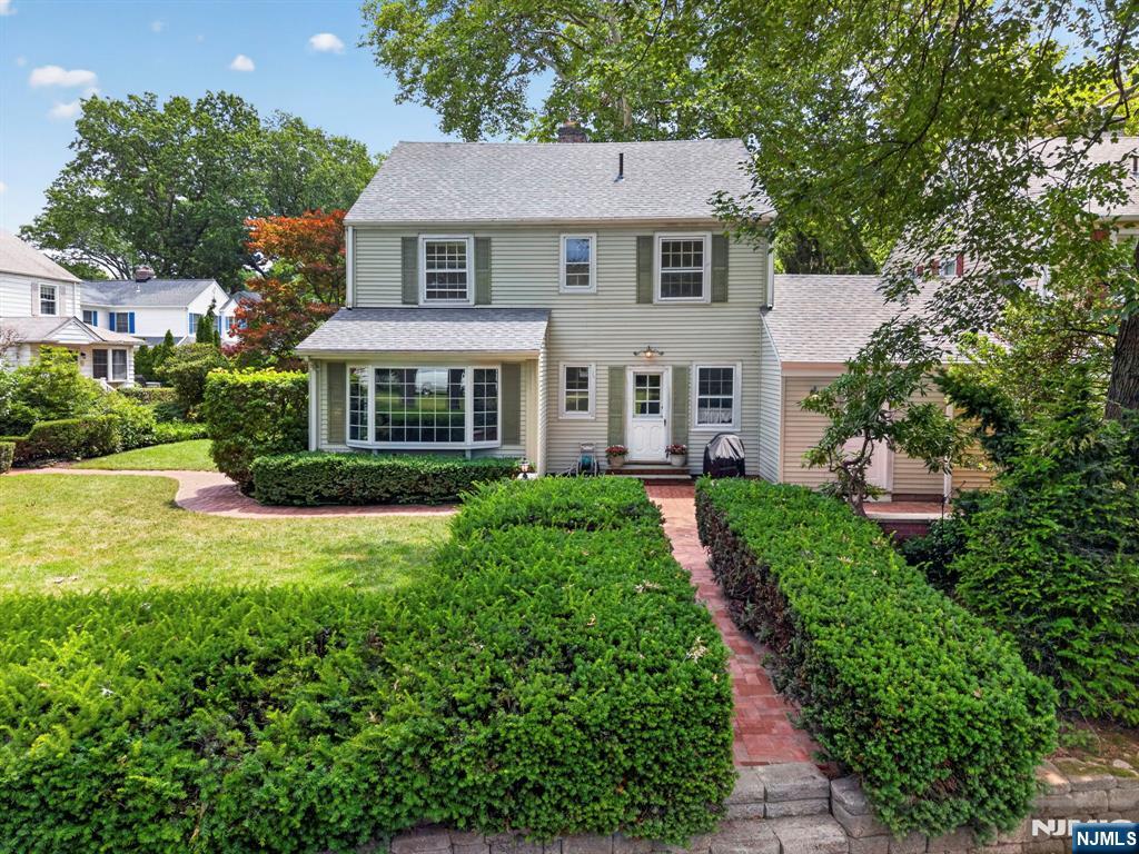 Nestled in one of Fair Lawn's most coveted B Park locations in the Radburn section, this timeless 4 BRM, 1.5 Bath Colonial offers just over 2,000 sqft of living space on a large 5,850 sqft corner lot, directly overlooking the park! Surrounded by greenery and filled with natural light, the home features spacious rooms, new carpeting over hardwood floors, a classic wood burning fireplace, and a versatile bonus room ideal for a variety of uses. Recent updates include a brand new roof, a 2020 boiler, a 2022 hot water heater, and fresh paint throughout. Perfectly positioned to enjoy Radburn's parks, scenic pathways, tennis courts, pools, and convenient commuter access, this is a rare opportunity to own a home that beautifully blends character, comfort, and an exceptional location. RadBurn HOA Fee's: The quarterly dues are $598.45. The 1-time capital contribution fee (non-refundable fee) for new owners is 3/4 of the annual maintenance fee on a home.