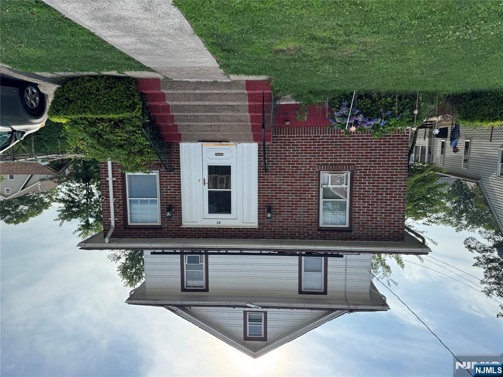 A GREAT HOME IN A VERY DESIRABLE TOWN, IN A GREAT NEIGHBORHOOD, HERE IT IS ! MUCH TO OFFER IN THIS 3 BDRM, 2 BTH. WITH OFFICE/DEN, FINISHED ATTIC. FULL BASEMENT WITH SIDE DOOR ENTRANCE. HARDWOOD FLOORS THROUGHOUT AND SPACIOUS BACKYARD. 1-CAR GARAGE AND DRIVEWAY. THAT CAN ACCOMMODATE 5+CARS. LESS THAN 5 MIN WALK TO EXPRESS BUS TO NYC. Lease Solor Panel System(Electric bill savings), lot size approx 63x110 & living space approximately1670, close to shcool & close to all. AS-IS sale. Schedule your tour today!