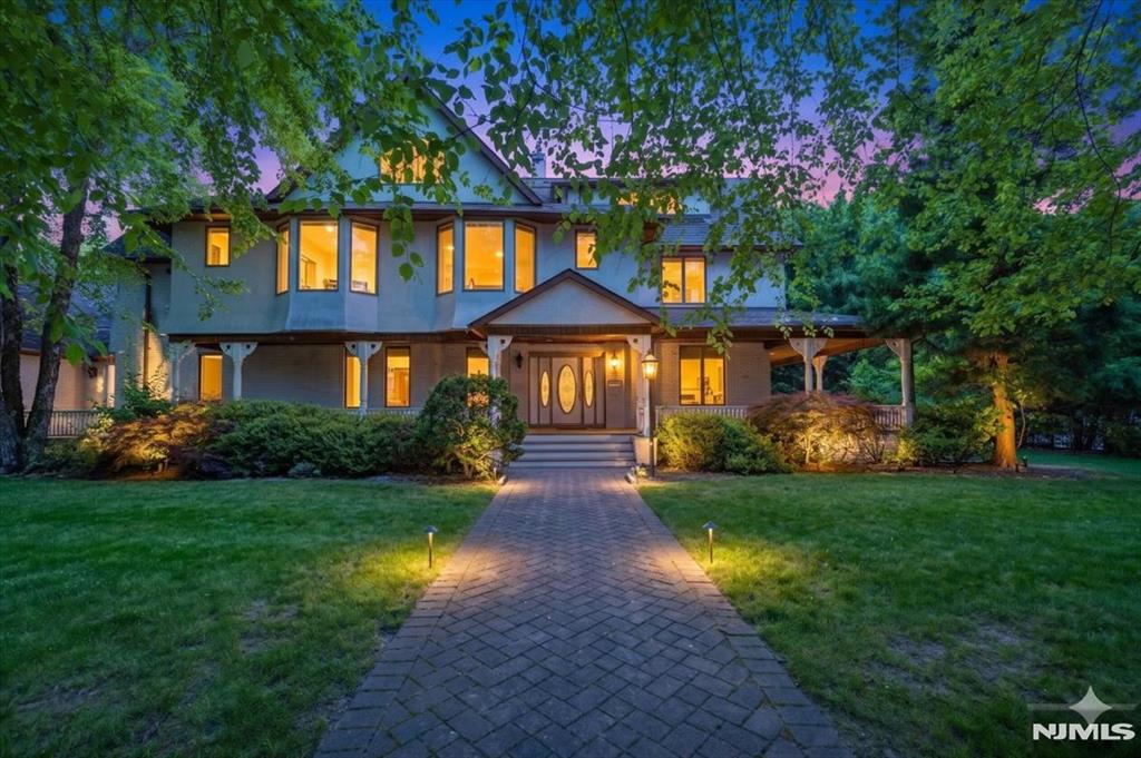 A rare opportunity to own one of Englewood's distinguished estate properties. Set on an expansive .86-acre lot, this stately residence offers over 6,200 square feet of living space, blending timeless architectural character with modern living. Built in 1907, the home showcases the charm and craftsmanship of a bygone era while providing the scale and layout desired for today's lifestyle. Generous living spaces, classic design elements, and a picturesque setting create an exceptional backdrop for entertaining, everyday living, enjoy your afternoons on the front or back wrap around porch overlooking the beautiful pool. The property is surrounded by mature landscaping and offers a private, estate-like atmosphere in one of Englewood's most desirable residential locations. With substantial interior square footage, an attached 4 car garage with sizeable gym over it, 2 story pool cabana with lounge area, and nearly an acre of land, the possibilities are endless. Conveniently located near Englewood's vibrant downtown, premier shopping, dining, parks, houses of worship, and major transportation routes to New York City, this is a unique chance to own a landmark property in a sought-after Bergen County community.