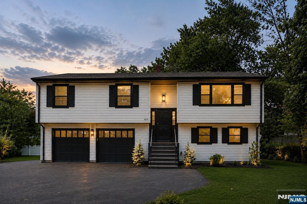 WELCOME TO THIS BEAUTIFULLY RENOVATED HOME SET ON AN OVERSIZED LOT IN THE HIGHLY DESIRABLE TOWN OF WYCKOFF. DESIGNED FOR MODERN LIVING, THIS HOME FEATURES AN OPEN-CONCEPT FLOOR PLAN WITH SPACIOUS LIVING AND DINING AREAS, ELEVATED CEILINGS, AND ABUNDANT NATURAL LIGHT THROUGHOUT. THE CUSTOM-DESIGNED KITCHEN OFFERS EXTENSIVE CABINETRY, GENEROUS STORAGE SPACE, AND A FUNCTIONAL LAYOUT PERFECT FOR EVERYDAY LIVING AND ENTERTAINING. THE MAIN LEVEL INCLUDES A SPACIOUS PRIMARY BEDROOM WITH A NEWLY RENOVATED EN-SUITE BATHROOM, ALONG WITH TWO ADDITIONAL BEDROOMS AND A BEAUTIFULLY UPDATED FULL BATHROOM. STEP OUTSIDE TO AN ENORMOUS COVERED DECK FEATURING RECESSED LIGHTING AND A CEILING FAN, CREATING THE PERFECT OUTDOOR LIVING AND ENTERTAINING SPACE OVERLOOKING THE EXPANSIVE BACKYARD. THE GROUND LEVEL OFFERS EXCEPTIONAL VERSATILITY WITH A LARGE FAMILY ROOM, A PRIVATE OFFICE OR POSSIBLE FOURTH BEDROOM, A FULL BATHROOM, LAUNDRY AREA, AND DIRECT ACCESS TO BOTH THE BACKYARD AND THE ATTACHED TWO-CAR GARAGE. IDEALLY LOCATED IN WYCKOFF, KNOWN FOR ITS TOP-RATED SCHOOLS, BEAUTIFUL PARKS, SHOPPING, RESTAURANTS, YMCA, AND STRONG SENSE OF COMMUNITY, THIS MOVE-IN-READY HOME OFFERS THE PERFECT COMBINATION OF COMFORT, CONVENIENCE, AND STYLE.