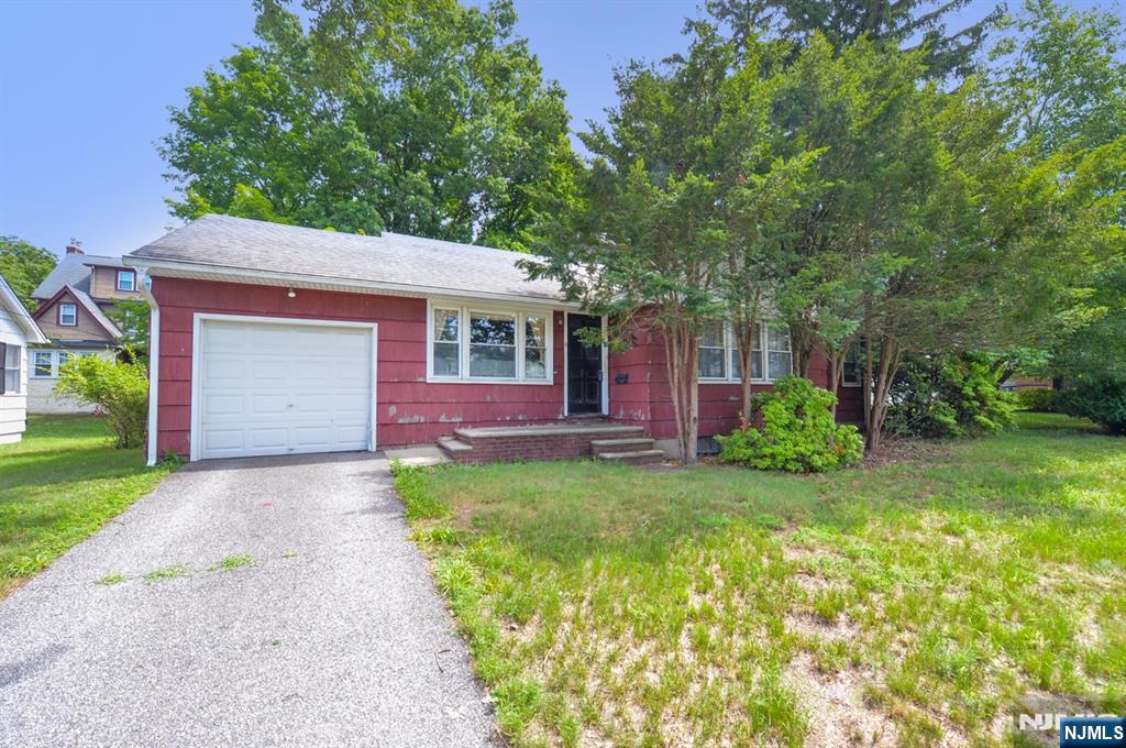 Lovingly maintained by long time owner/family. This home was custom built by the original owner. Beautiful custom woodwork throughout. Entry foyer opens to oversized living room with wood burning fireplace. Large formal dining room with built in cabinetry. Eat in kitchen with pantry closet. Rear door off of kitchen opens to screened in porch. 3 good sized bedrooms all with ample closet space. Full bathroom. Huge basement with high ceilings and loads of potential! Lot size 75 x 100. Central air. A must see to appreciate!