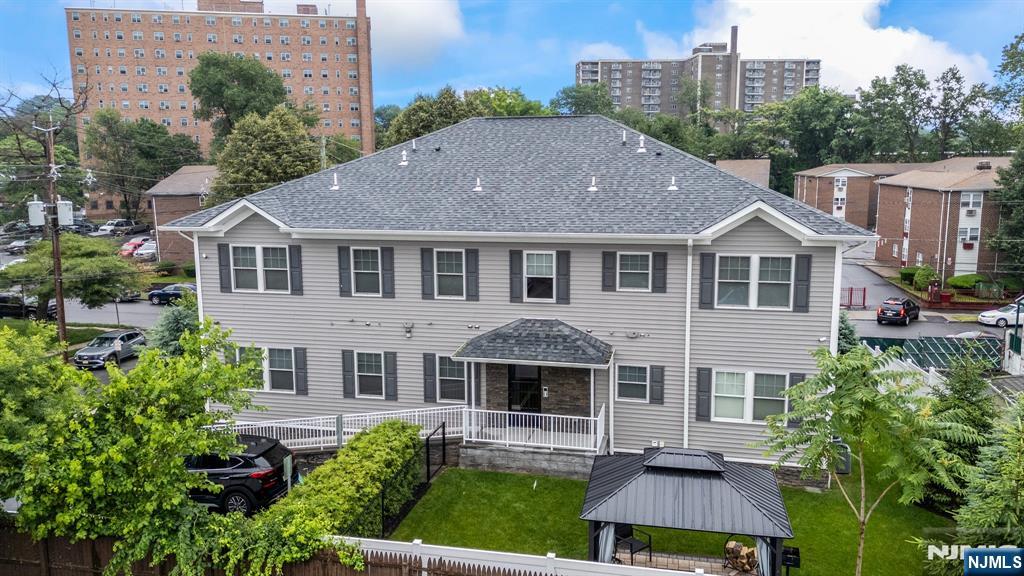Exceptional opportunity to acquire a modern, income-producing multifamily asset in one of Belleville's most desirable and commuter-friendly locations. Built in 2020, this well-maintained 6-unit property offers the ideal combination of strong rental appeal, low-maintenance ownership, and long-term investment potential. The building consists of three spacious 2-bedroom/2-bath units and three well-designed 1-bedroom/1-bath units, all featuring contemporary finishes that attract and retain quality tenants. Each apartment includes stainless steel appliances, modern cabinetry, hardwood flooring throughout, and in-unit laundry for maximum tenant convenience and premium rental appeal. Designed with both functionality and tenant satisfaction in mind, the property also offers 14 parking spaces, assigned storage units, security system, lawn sprinkler system, and ADA-friendly accessibility with an easy-access move-in ramp. Residents enjoy a shared outdoor patio with fire pit, adding lifestyle value that enhances tenant retention. The property provides convenient access to public transportation and major commuting routes. Add this exceptional investment property to your portfolio today.
