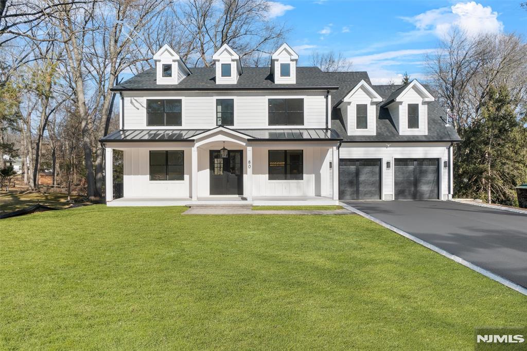 Nestled on a quiet street, this brand-new luxury home offers over 5000 sq ft of meticulously designed living space. This stunning residence is the perfect blend of elegance, comfort, and convenience. Step inside to find beautiful white oak h/w floors flowing seamlessly throughout this sunlit home. The main level boasts a gourmet kitchen outfitted w/top-of-the-line Viking appliances, custom cabinetry, and spacious Quartz island - ideal for both casual dining and entertaining. The open concept design leads into family room with gas fireplace, and access to a covered Trex deck. Upstairs, the primary suite is a true retreat, featuring tray ceilings, two generous walk-in closets, and a spa-like bath. Three additional bedrooms are generously sized, offering en suite baths as well. The full walkout basement, expands the home's living space; complete with an enclosed glass exercise room, 5th bedroom with en suite, and direct access to a beautiful patio - perfect for outdoor relaxation.