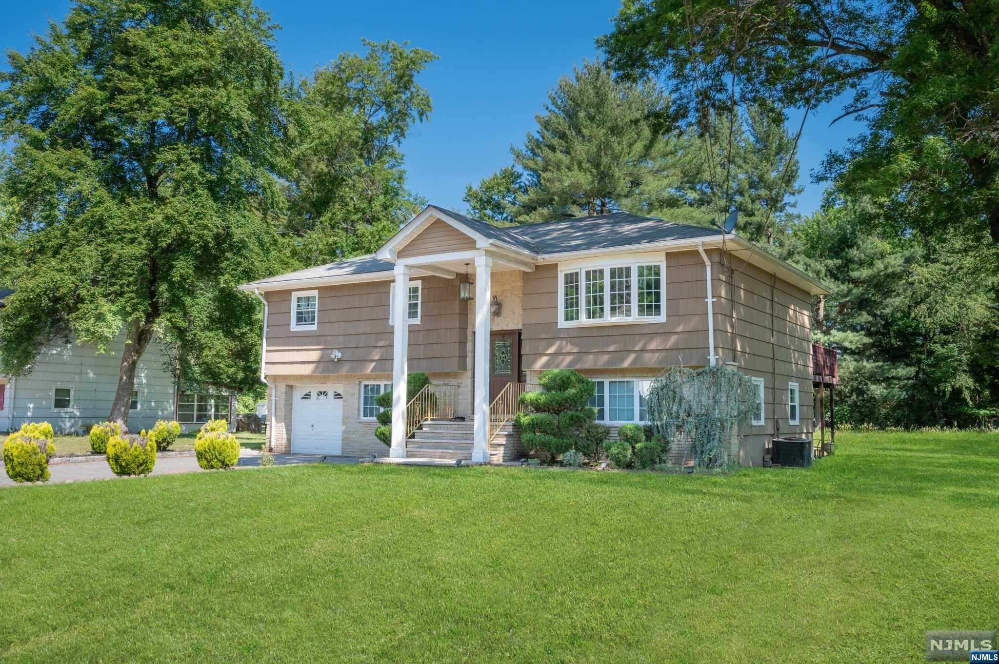Welcome to this charming 5-bedroom, 2-bathroom bi-level home located on a quiet street. This spacious property offers ample living space for you and your family. As you enter the home, you will immediately notice the gleaming hardwood floors that extend throughout the main living areas. Located on a quiet street, this home offers a peaceful and serene setting. You can enjoy the privacy of the backyard, perfect for outdoor activities or a quiet retreat. Quiet neighborhood the proximity to schools and shopping centers makes daily errands convenient.
