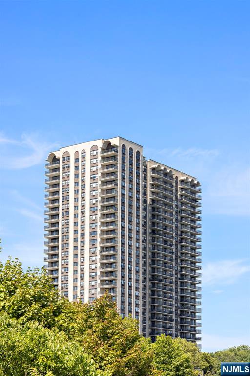 Huuge Condo at Parker Imperial - Spanning Over 1300SF including extra large terrace and the most stunning Sunset Views- Move in Ready - Expansive Primary Suite with Walk in Closet sits on the quiet side of the building - Primary Bathroom with Marble XL Vanity and Shower/Tub. The Living Room opens to the Kitchen with Quartz countertop and backsplash, electric range, and microwave. The 2nd bedroom was created out of a piece of the living room and can also make a great office or den. The location cannot be beat, right next to the 167-acre lakefront, clifftop park with NYC views and 45 sports facilities, trails & a dog run. Easy access to Ferry and public transportation to the city. Improve your quality of life with the conveniences of the Parker Imperial: 24-hour doorman & garage attendant,On-site management, Fitness center, Outdoor heated pool (currently being replaced), Lobby currently being renovated! The HOA includes one assigned parking space, hot/cold water, fitness center access, & pool. You will not find a more spacious move in ready unit at this price per square foot anywhere! Come take a look!