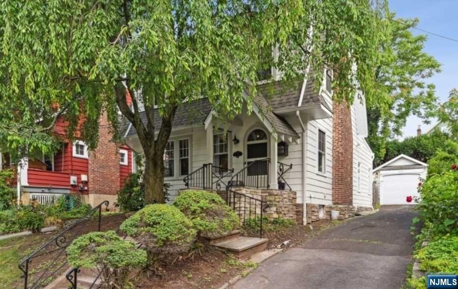 Your new home awaits in this classic 4 bed, 2 bath Colonial in walking distance to Maplewood Village, shops, restaurants, parks & trains to NYC/Hoboken. Featuring beautifully-refinished hardwood floors thru-out, charming original wood trim & built-ins, fresh paint inside & out & a new roof -- this home is just waiting for you to move in! Relax in front of the wood-burning fireplace in the living room & grab a book from the original built-in bookcases. The formal dining room leads to an oversized eat-in-kitchen wh 6-burner gas stove & cozy breakfast nook for your morning coffee. The family room just off the kitchen is the ideal hang-out spot -- & walk right out to the fenced-in backyard w private patio. The 2nd floor incl 3 bedrooms including an oversized primary bedroom, plus a full hall bath. The 3rd floor offers a large fourth bedroom or flexible space & features brand-new carpeting. The basement incl a full bath plus laundry area, and has potential for finishing.