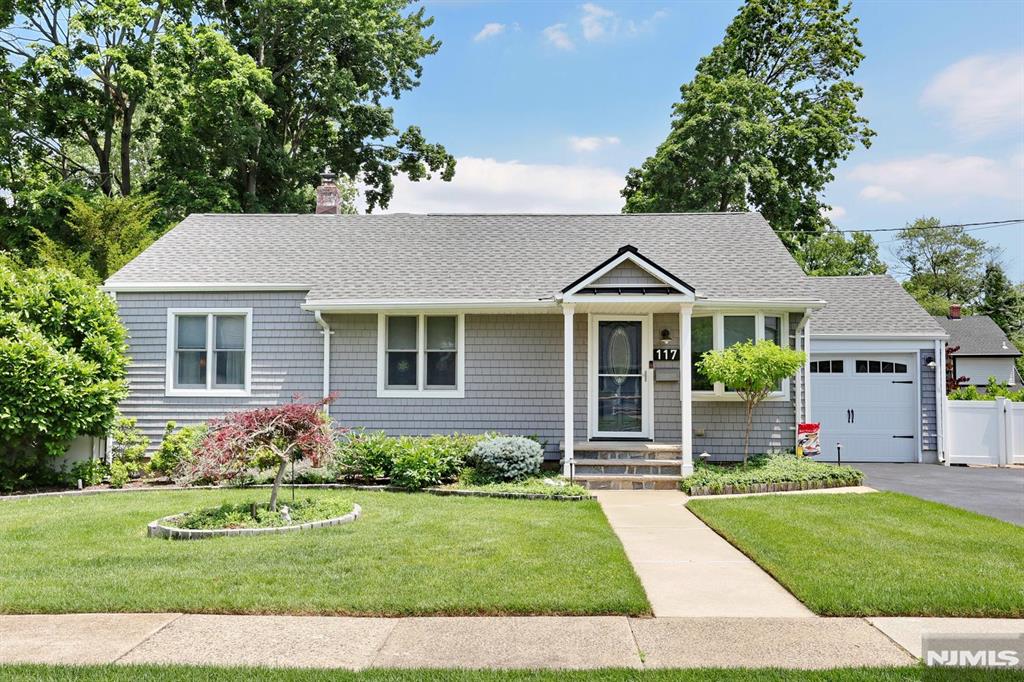 Welcome to 117 Roxbury Rd! Move-in, sit down and enjoy this one floor living GEM of a ranch! Enter into the living room, dining room w/sliders to deck, Beautiful expanded eat-in-kitchen w/granite & SS appliances opens to large family room w/fireplace & vaulted ceilings. Off the family room is a bedroom w/WIC & full bath, perfect for guests or extended family living! Down the hall is your primary bedroom, 2 additional bedrooms & full bath. Additional living space is found in the full finished basement w/rec room, bar, home gym, full bath, laundry, utilities & storage! Other features include: hardwoor floors where-in, central air (6 yrs), gas hot air furnace (6 yrs), newer roof & siding (2023), 200 amp electric panel, Fully fenced yard (newer fence) w/deck, patio & shed, 1 car attached garage, newer driveway w/parking for 4 cars, beautifully landscaped property and so much more! A MUST SEE home located on Dumont's east side, close to NYC transportation. Schedule your appointment today!