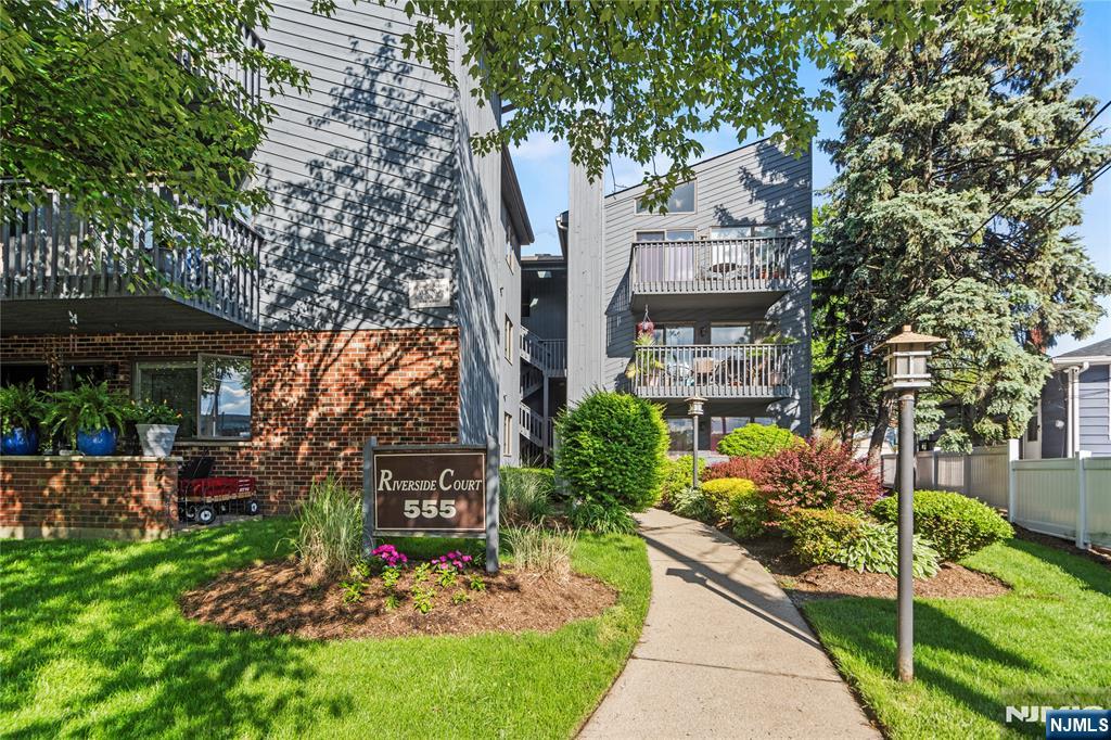 Experience effortless living in this spacious top-level 2-bedroom, 2-full bath condo, where comfort, style, and convenience come together at Riverside Court. The thoughtfully designed open-concept floor plan connects the living room, dining area, and kitchen, creating the perfect space for both everyday living and entertaining. A welcoming foyer leads to a spacious living room featuring vaulted cathedral ceiling and skylight that fills the space with natural light. A wood-burning fireplace adds warmth and charm, while sliding glass doors lead to a private terrace overlooking the river. The galley kitchen and adjoining dining area provide the perfect setting for everyday meals. The spacious primary suite boasts a large closet for ample storage and a private en-suite bath. A second generously sized bedroom and an additional full bath provide flexibility for family, guests or a home office. Enjoy the convenience of a dedicated parking space, along with an in-unit washer/dryer and storage to simplify everyday living. Central AC and Heating. Ideally located for commuters, this community is just two blocks from Lyndhurst Train Station, with Rutherford Train Station and NYC bus nearby. Convenient access to major highways makes commuting and travel simple and efficient. Tenant Pays utilities. Landlord will consider a small pet. No Smoking! Donâ€™t miss this opportunity for comfortable living in a prime location!
