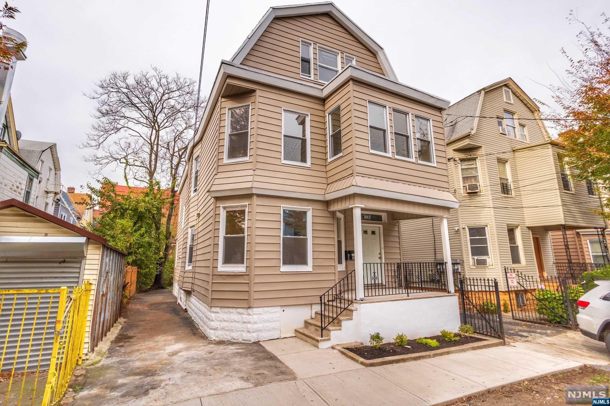 This fully renovated VACANT 3 family home with parking is ready to generate huge income for its new owner. Located in desirable North Newark neighborhood, this property is a solid investment whether you plan to live in it or keep as a rental. Offering nearly 3,000 sq ft of living space between 3 spacious apartments with hardwood flooring, tall ceilings, renovated kitchens and bathrooms, and forced air heat! Units 1 & 2 have similar layouts with open eat-in kitchen / living room area, 3 ample bedrooms, and full bath. the 2nd unit also includes an oversized closet and porch off the primary bedroom. Market rent for these apts ranges from $1,900-$2,100. The 3rd unit has a large living room, renovated eat in kitchen, 1 br and full bath. Market rent for this unit is between $1,300-$1,450. The large unfinished basement has a separate entrance and has many possibilities. Separate utilities, furnaces & water heaters. Extra low taxes of only $6,459.