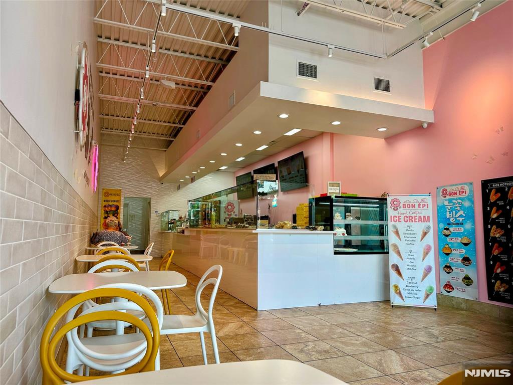 Turnkey Culinary Business Opportunity in Prime Retail Location â€“ Fort Lee, NJ An exceptional opportunity for the food and beverage shopsâ€”ideal for cafés, bakeries, dessert shops, full-service restaurants or franchisees. This fully equipped commercial kitchen comes with a full restaurant license, offering a ready-to-operate environment suited for a wide range of culinary ventures. Located in the highly trafficked Washington Bridge Plaza in Fort Lee, NJ, the retail space boasts high visibility between two major anchor tenantsâ€”Walgreens and Dollar Treeâ€”ensuring a consistent flow of foot traffic. The unit encompasses approximately 1,641 square feet and includes two restrooms, a commercial-grade kitchen, a designated storage area, and a customer seating area. Strategically positioned in a plaza with the largest parking facility in the vicinity, this location is easily accessible to patrons from both northern New Jersey and nearby New York City, making it a desirable hub for local and commuter clientele alike.