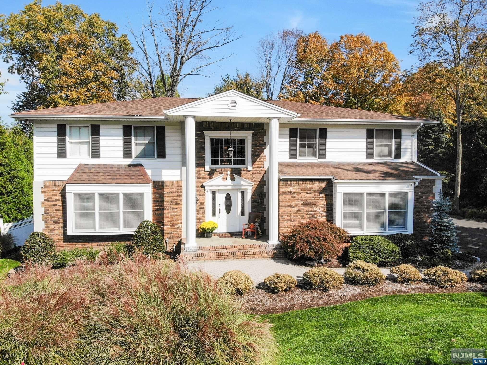 Must see Magnificant colonial! Beautifully landscape designed 3/4 acre property offers an abundance of natural color throughout the year. This well maintained 4,700 sq ft home is located on a cul-de-sac and offers 5 bedrooms, 3 full baths and 2 half baths. Impressive 2 story entryway opens to formal living room with recessed lighting. The adjoining dining room opens to an entertainer's dream kitchen with granite countertops, two toned cabinetry, a vaulted ceilings, large center island, heated ceramic floors, expansive dining area, walk-in pantry and French doors leading to a delightful fully fenced backyard with 2 level paved stone patio. Two steps off the kitchen is a spacious 1/2 bath, separate laundry room, access to the attached 2 car garage, mud room/hallway and backdoor which opens to the back porch. Open to the kitchen is a cozy family room with gas fireplace, monitor/bose stm / built ins. LA related to seller.
