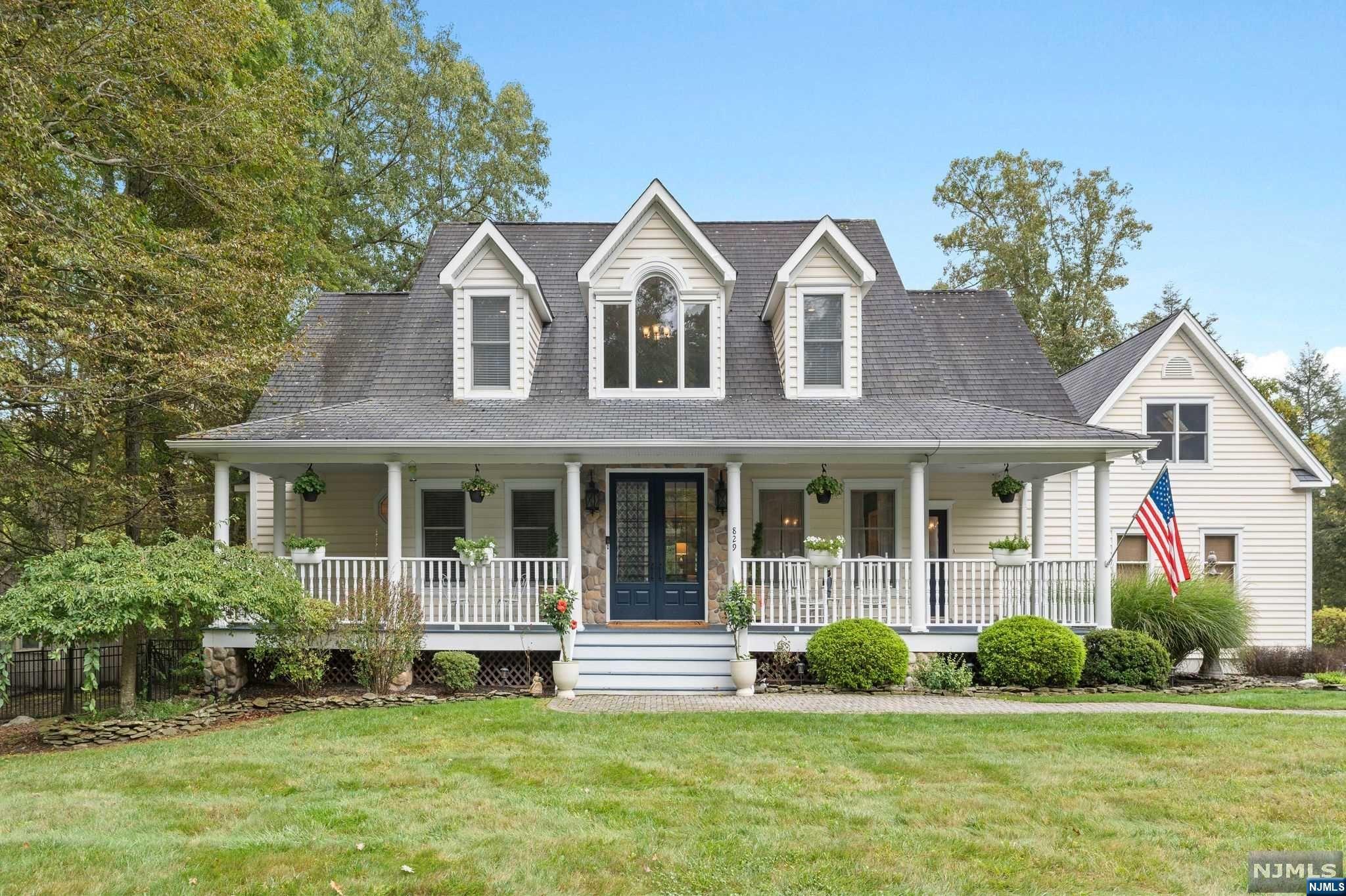 Welcome to this custom-built Colonial from 2004, offering 4 bedrooms, 3.5 baths, and nearly 3,000 sq ft of refined living space on 1.5 acres of park-like grounds. Its inviting curb appeal features mature landscaping and a charming front porch. Inside, the open floor plan is filled with natural light from large windows and skylights. The two-story great room with soaring ceilings and an elegant fireplace connects to a covered deck overlooking the professionally landscaped backyard and inground pool. The formal dining room is adorned with crown molding. The gourmet kitchen includes stainless steel appliances, granite countertops, a center island, and a spacious dining area. Of the 4 large bedrooms, 3 have private ensuite baths, including the primary suite. An unfinished bonus room above the garage, prepped with plumbing and electric, offers options for additional space or rental potential. The full, unfinished basement invites customization.