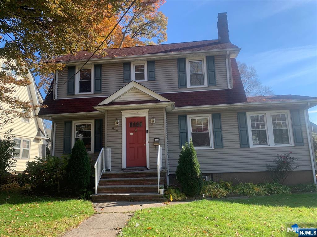 Welcome to this spacious 3-bedroom, 2.5-bath Colonial located in one of Teaneck's most desirable neighborhoods. The first floor features an updated kitchen, a powder room, a bright living room with a fireplace, a formal dining room, a home office, an enclosed porch, and a convenient laundry area. Upstairs, you'll find three generously sized bedrooms and a full bathroom. The finished ground level offers a large recreation room, an additional office or flex space, a full bathroom, and a second kitchen complete with a sink, oven, and refrigeratorâ€”ideal for extended living or entertaining. Outside, enjoy a detached one-car garage and a private backyard. Conveniently located near top-rated schools, NYC transportation, parks, shopping, and houses of worship, this home offers both comfort and convenience. Don't miss this exceptional opportunity!