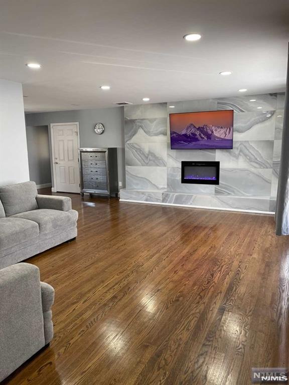 Welcome Home! Beautiful custom brick ranch. Features Large Living Room with Fire Place, Formal Dining Room, Hardwood Floors, Central AC, All appliances new, Renovated bathrooms, Smart TV's in every room. Google Nest Installed, Electrical bed with massage, Oversized two car garage. Access from the Kitchen to the garage, yard. Finished basement with laundry & storage , Rear patio, Property with amazing yard, Front porch, Elementary school right across the street. House rented fully furnished.