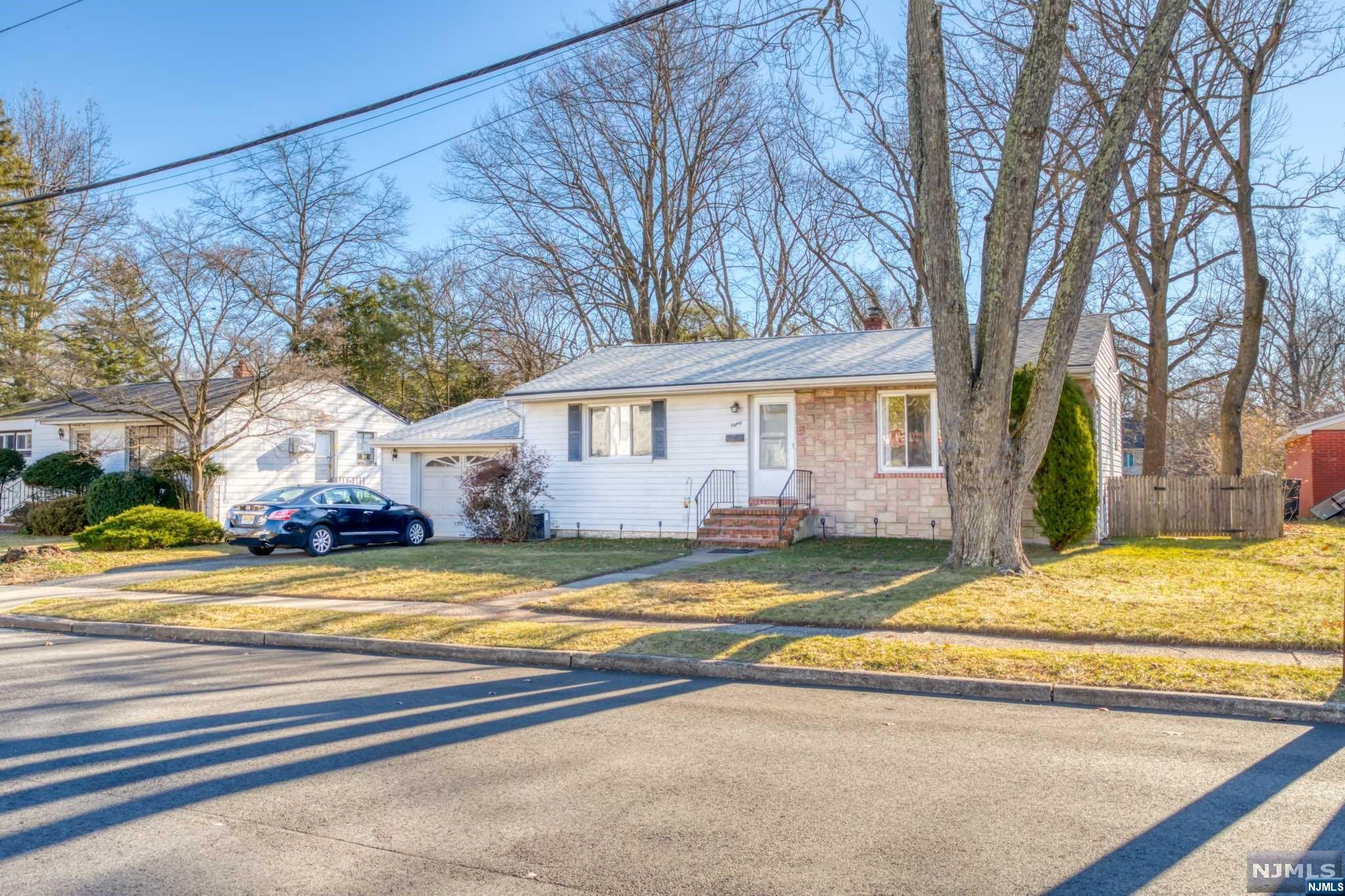 Welcome to this one floor ranch with an open floor plan for easy living! Located in desirable Cresskill, just a short walk to NYC transportation. The first floor features a living room and recessed lighting which opens to the eat in kitchen which features newer appliances. All hardwood floors throughout and central air. Convenient living featuring 3 bedrooms and a renovated full bathroom. The lower level is unfinished and offers endless possibilities to create a recreation room, bathroom, or anything you may think of. The garage is attached and accessible through the basement. The fenced in yard is fully fenced and includes a deck and garden boxes. Great value!