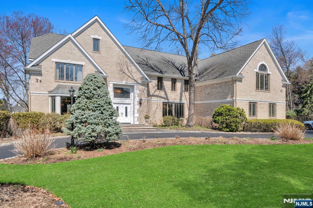 Set on over an acre of manicured grounds in the prestigious High Woods area of Franklin Lakes, this exceptional Leonard built, 5BR, 4.5BA estate offers approx. 6,081 sq ft of elegant living space designed for both everyday comfort and entertaining. A dramatic 2-story foyer opens to a sun-filled 2-story great room, while formal living and banquet-sized dining rooms provide the perfect setting for gatherings. The expansive Ulrich kitchen features dual sinks, dual dishwashers, abundant prep space, and a rear staircase. A first-floor guest bedroom with full bath and laundry room offer flexible living options. Custom millwork throughout highlights the homeâ€™s craftsmanship. Upstairs, the primary suite includes a sitting area, cedar walk-in closets, and a spa-like bath with soaking tub, separate shower, and private water closet. An en-suite bedroom and two additional bedrooms with a dual-entry bath complete the level. Outdoors, a resort-style pool and beautifully landscaped grounds create a private oasis for relaxing and entertaining. A rare opportunity in one of Franklin Lakesâ€™ most sought-after neighborhoods.