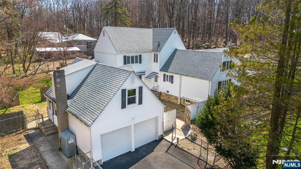 Sprawling home on 5+ acres with incredible potential, offered at $799,000. This unique property features a 4 bedroom, 3 full bath home set on a fully fenced 5.4 acre lot. Ideal for dog lovers or entrepreneurs looking to live and work in one location, the property includes kennel buildings with indoor and outdoor runs, large play areas, and an equipment barn. Plenty of space to own and operate your own kennel, boarding, or training facility. The home offers generous living space but needs some TLC. Property being sold strictly as-is, presenting a great opportunity to add value and create your vision.