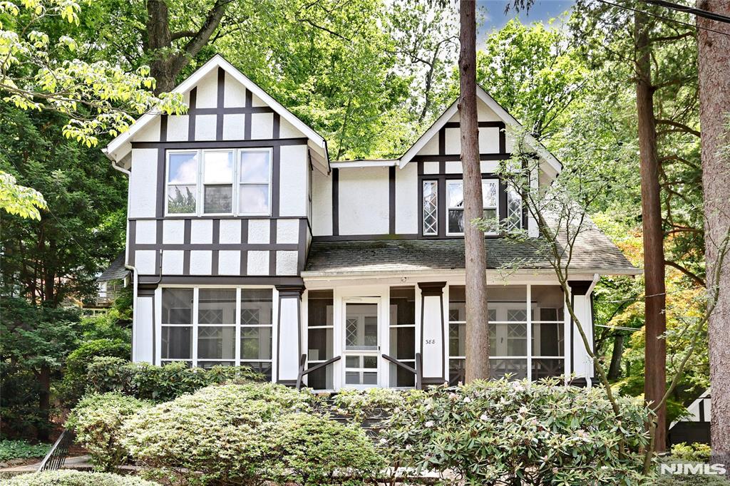 Large Tudor Colonial perched atop Allaire Ave on the desirable East Hill of Leonia, filled with abundant natural light throughout. This artistâ€™s retreat features a dedicated art studio, 4 bedrooms, and 1.5 baths, along with a spacious living room, formal dining room, and bright eat-in kitchen. Enjoy the charming oversized front porch, perfect for entertaining or relaxing outdoors, as well as a cozy sunroom off the primary bedroom. The full finished basement provides additional studio space and ample art storage. Ideally located near transportation to NYC and just minutes from the GW Bridge. Leonia is known for its excellent schools, vibrant artist community, and convenient access to parks, shopping, and dining. Rare opportunity to own a distinctive home in one of Bergen Countyâ€™s most sought-after neighborhoods.