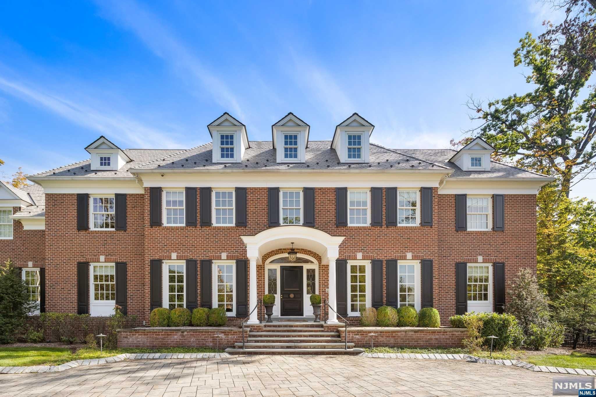 Modern Elegance, Classic Design, Quality of contruction and Custom millwork come togther in this Stunning Home on a coveted street in Saddle River! Built in 2016 by George Kevo and Architect Robert Zampolin, this Special home boasts 10 ft ceilings on main level, hwd floors and the Ideal floor plan- open flow and perfect for today's lifestyle! You will love the custom kitchen, Sun-filled Great rm and bar. The formal dining rm is perfect for entertaining. The study is a splendid getaway to work/relax by the fire. Also on the main level is a ensuite, powder rm and full pool bath w/laundry. Take the grand staircase to the second floor where you will find a Primary suite with 2 Custom WIC, a primary bath that is unparalleled and a wet bar. Also 3 add'l ensuites and a massive laundry rm. The basement has high ceilings, Fireplace, plumbed for a fbth and walkout to yard. Amenities inc elevator, front/back staircase, 4 car gar,generator,smart home and so much more. Amazing Opportunity!