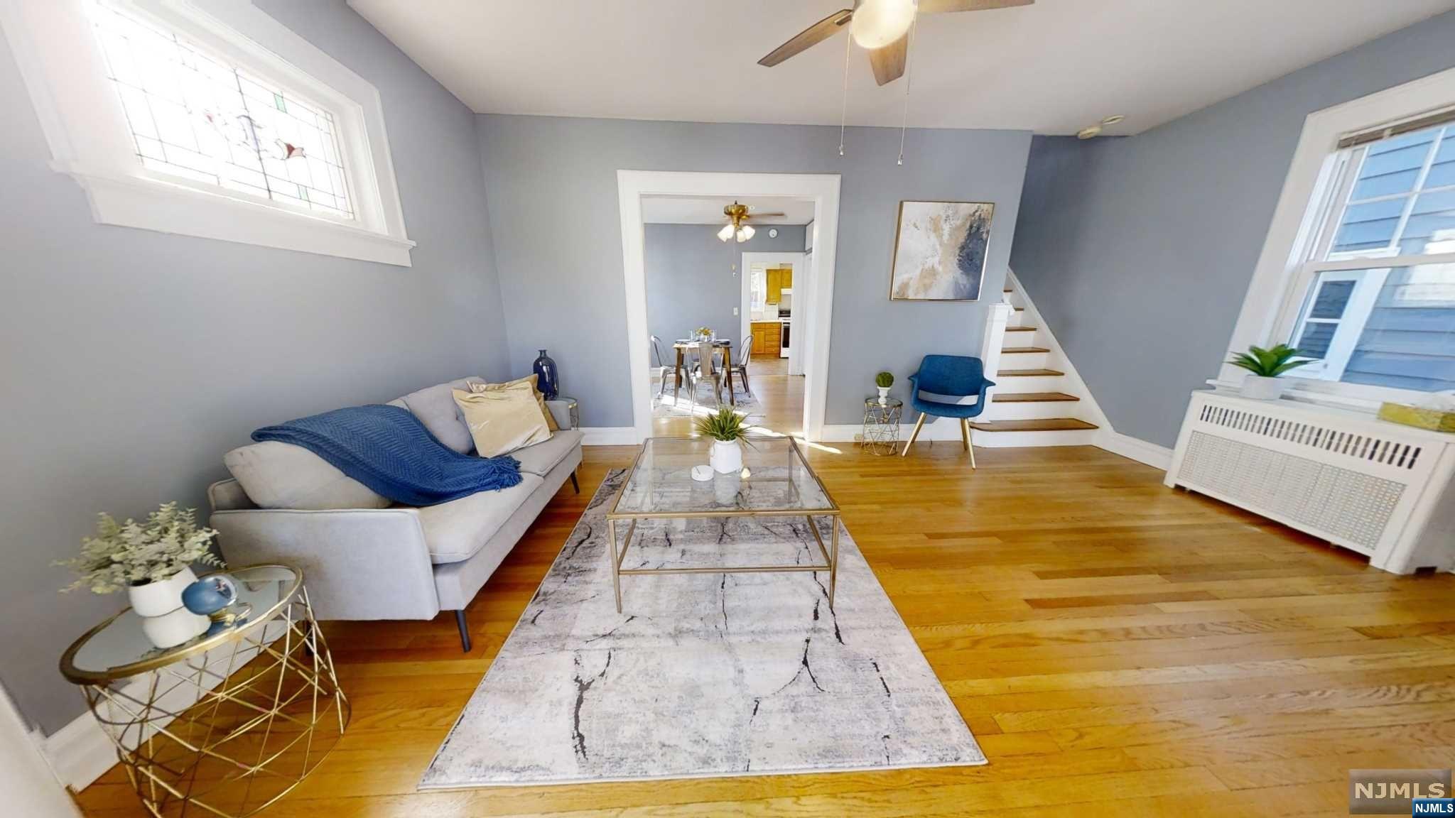 2,132 sq ft Total (More spacious than it looks!) HUGE LOT 50x100 - (Parking space /Driveway is 25ft Wide) LARGE BACKYARD - Beautiful Hardwood Floors that were just refinished, Home has just been Re-Painted, FURNACE was JUST REPLACED - Water Heater newer as well. Entrance Foyer/ Mud Room - Large Living Rm - Den - Formal Dining Rm - Eat in Kitchen - 3 Bedrms on the 2nd Flr - (1 is Captive) - Walk up attic (if finished could create additional living space it has a great height) - Great quiet Street - Location A+ Jitney shuttle stop to the MAPLEWOOD TRAIN is 1 BLOCK over. Windows are newer - Floors Re-Finished Natural