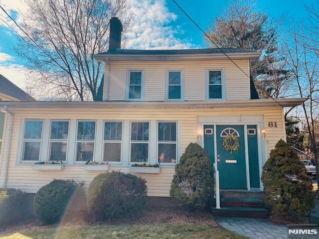 This classic Colonial offers over 2,600 sq ft across three full levels in a prime Midland Park location, highlighted by rich chestnut woodwork, oversized rooms, and a BRAND NEW ROOF, that offers immediate value. The main level features a spacious living room with a wood-burning fireplace, heated sunroom/office, banquet-sized dining room, eat-in kitchen with granite countertops and newer appliances, and a family room with a free-standing wood stove. Upstairs includes three bedroomsâ€”one currently used as a walk-in closetâ€”and space to add a bath. The third level adds a fourth bedroom and additional storage. A full walkout basement, deep backyard, and detached two-car garage complete the home. Close to schools, parks, and NJ Transit (bus/train), this is a rare opportunity offering space, character, and value.