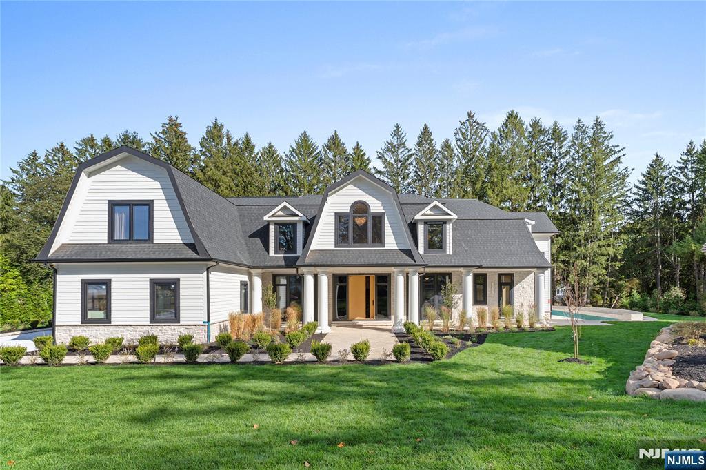 48 Pleasant Avenue, Upper Saddle River, NJ | Where Timeless Design Meets Modern Innovation Set on one of Upper Saddle Riverâ€™s most distinguished streets, 48 Pleasant Avenue is a newly constructed estate that blends architectural sophistication with modern functionality. Built on a new foundation and finished with LP wood siding, this 12,900 square feet, 6-bedroom, 6 full en-suite and 3 half-bath residence showcases refined design across every level. Inside, soaring ceilings and radiant-heated floors define a space that is both luxurious and livable. The main floor features a gourmet kitchen, formal dining area, and a first-floor ensuite bedroom for flexibility. The lower level is designed for recreation and creativity, with an art studio, fitness area, movie room, and family/game room under 10-foot ceilings. A private elevator connects all levels, including a second-floor office and an unfinished attic ready for customization. Every bedroom offers comfort and privacy, while the home is pre-wired for Cat 6 connectivity, security, and smart-home integration. Outdoors, enjoy a resort-style heated saltwater pool, sprinkler system, and expansive patio. A 6-car garage and 15+ car driveway provide ample parking. With multi-zone radiant heat, central air, municipal water, and septic with unlimited capacity for the house and barn, this home delivers performance, luxury, and longevity in Bergen Countyâ€™s premier enclave.