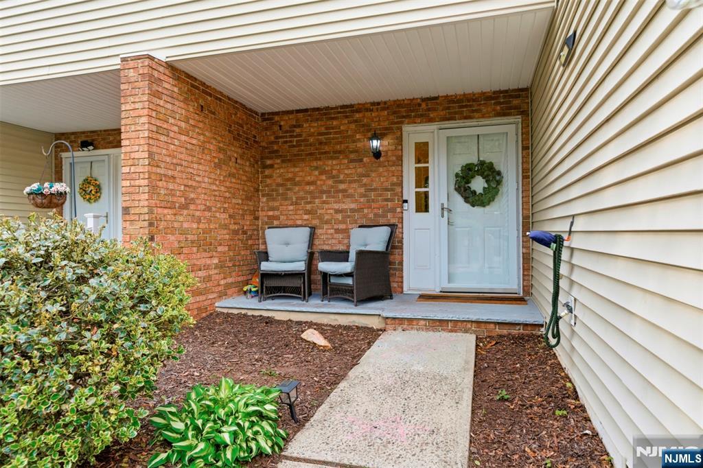 CHARMING TOWNHOME ON A DESIRABLE CUL-DE-SAC. Offers three spacious bedrooms, two full baths and one half bath. Set in a quiet, welcoming community in Wayne. offers an ideal blend of comfort, flow, and versatility across three finished levels. The first floor features a living room, a dedicated dining space, and a beautiful kitchen with an open-concept layout perfect for modern living and entertaining. A convenient half bath, laundry room, and bonus walk-in closet complete the main level. Upstairs, you'll find three generously sized bedrooms and two full bathrooms, including a spacious and bright primary/ master bedroom, with it's own bath. 2 other bed rooms and full bath, The finished basement expands your options to a large rec room and a bonus space ideal for a home office or storage. Deck to access, from the kitchen or living room. Nice private yard. Enjoy access to a community pool, tennis courts, and the NYC express bus just a short stroll away.