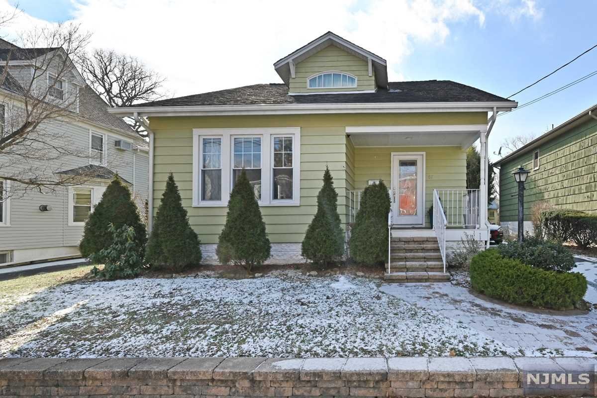 Deceptively large & full of charm & character! This large, move-in ready cape has an open flow from the inviting entry foyer into the living rm & dining rm, & through to the updated kitchen w/granite counters, stainless appliances & large walk in pantry! Additional features include beautiful hardwood flrs w/original inlay designs, central AC, 2 full bathrms, a great 1st flr bonus rm for home office, den or play rm! Also a huge basement ready for your finishing designs for a terrific Rec Rm, Gym and more! Add the private & pleasant backyard and you have a wonderful place to call your new home, on a great street in the highly desirable town of Maywood! Walk to schools, parks, Bergen Town Center with Target & Whole Foods, and only a few blocks from NYC Bus ! Dont Miss this one !!!