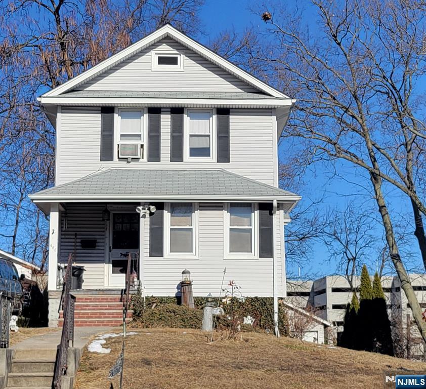 Don't miss out on this fantastic opportunity! This charming 3-bedroom, 1-bath colonial home is ready for your vision and updates. The covered front entry welcomes you into a spacious living room, dining room, and a kitchen with a pantry. A bright sunroom or sitting room adds extra living space. Upstairs, you'll find three generously sized bedrooms and a full bath. The full attic provides ample storage, while the unfinished basement includes laundry hookups, utilities, and additional storage space. Outside, enjoy the convenience of a 2-car detached garage. Located in the highly sought-after town of Nutley, this home is being sold strictly as-is, offering great potential for the right buyer looking to make it their own. Home being sold as is condition. Buyer responsible for any fees, permits and additional requirements for the cco from the town.